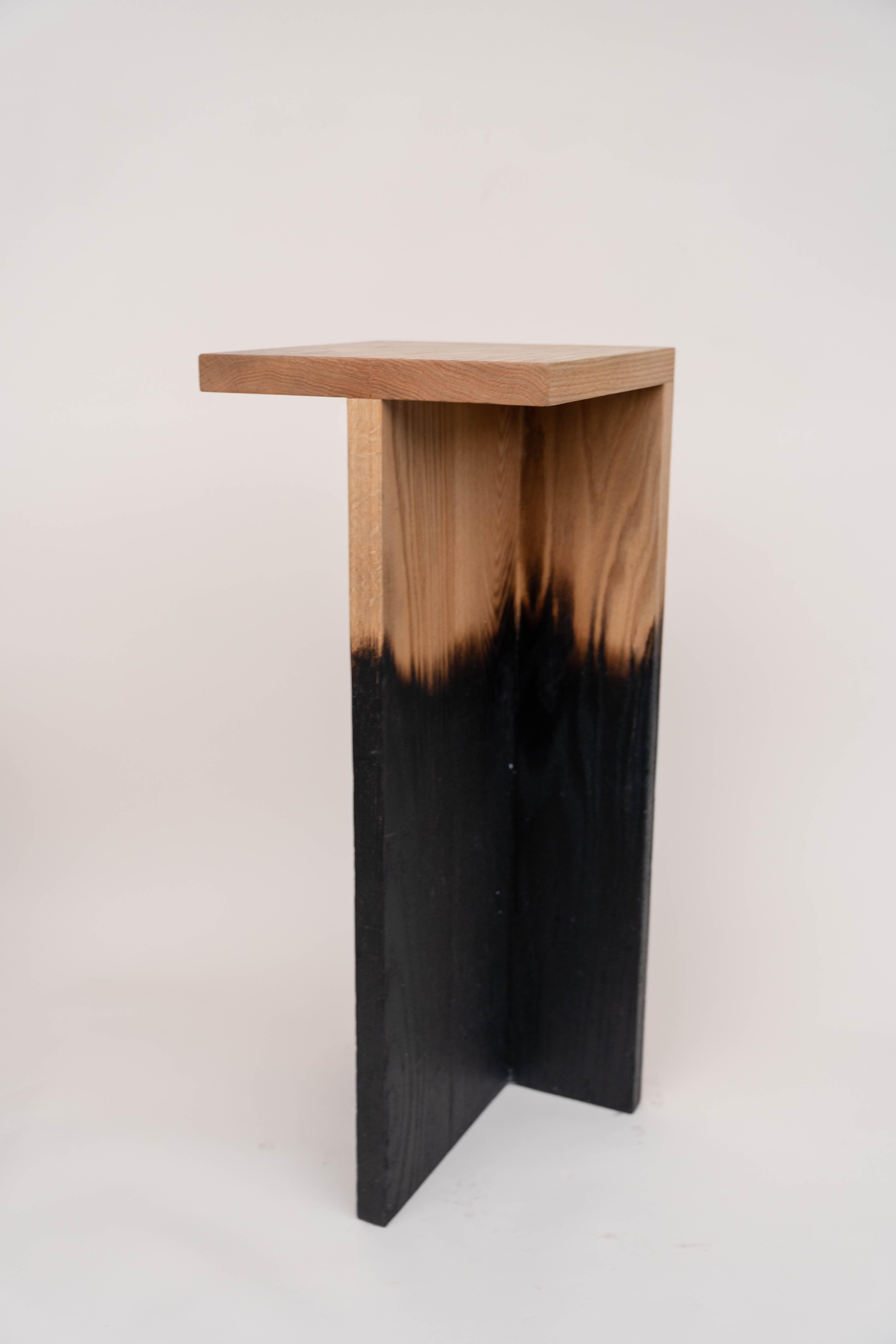 High burnt oak stool by Daniel Elkayam
Edition of 4
Dimensions: D 30 x W 30 x H 75 cm
Materials: Oak Wood

The Charred Collection
A collection of handmade wooden objects inspired by one of the most powerful natural phenomena in our world, which is
