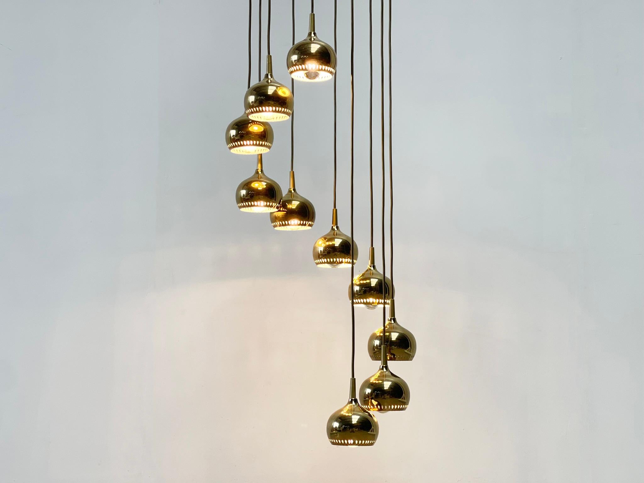 Brass High ceiling brass chandelier For Sale