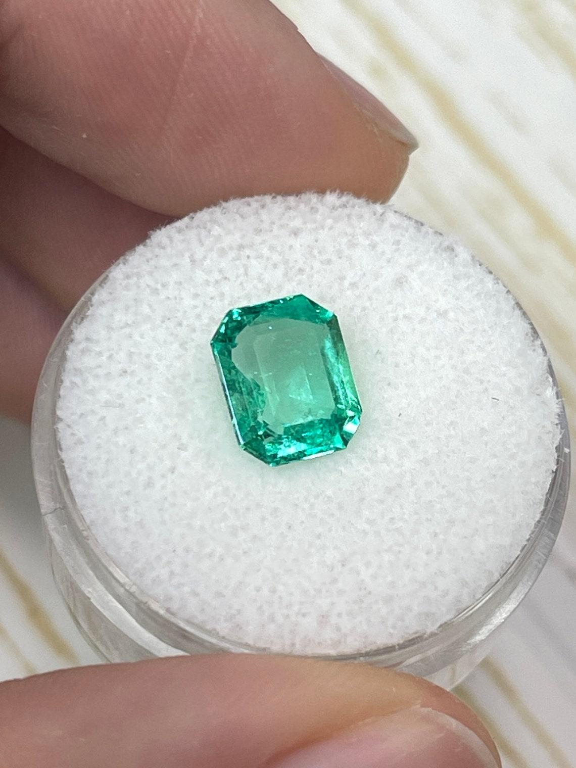Modern High Clarity 2.14 Carat Yellowish Green Muzo Emerald Cut Colombian Gem - May For Sale