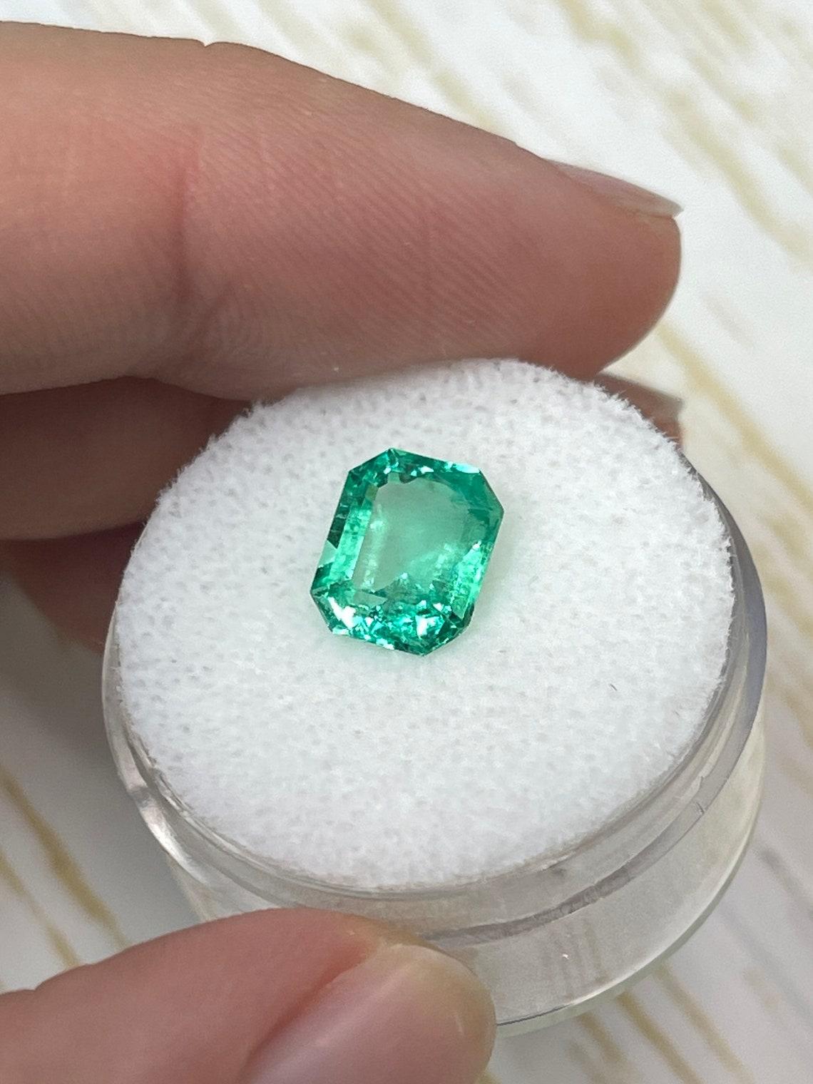 Women's High Clarity 2.14 Carat Yellowish Green Muzo Emerald Cut Colombian Gem - May For Sale