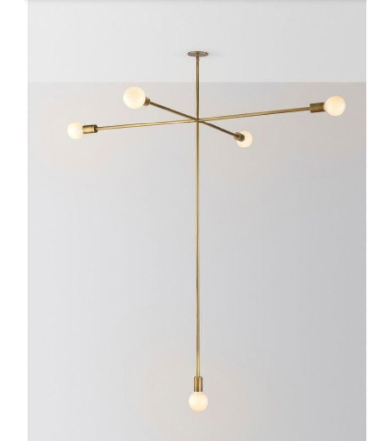 High cross kick pendant light by Volker Haug
Dimensions: Diameter 133.5 x Height 92 cm 
Material: Brass. 
Finishes: Polished, aged, brushed, bronzed, blackened, or plated
Lamp: Opal G95 LED (E26/E27 110 - 240V, 12V version available)
Weight: