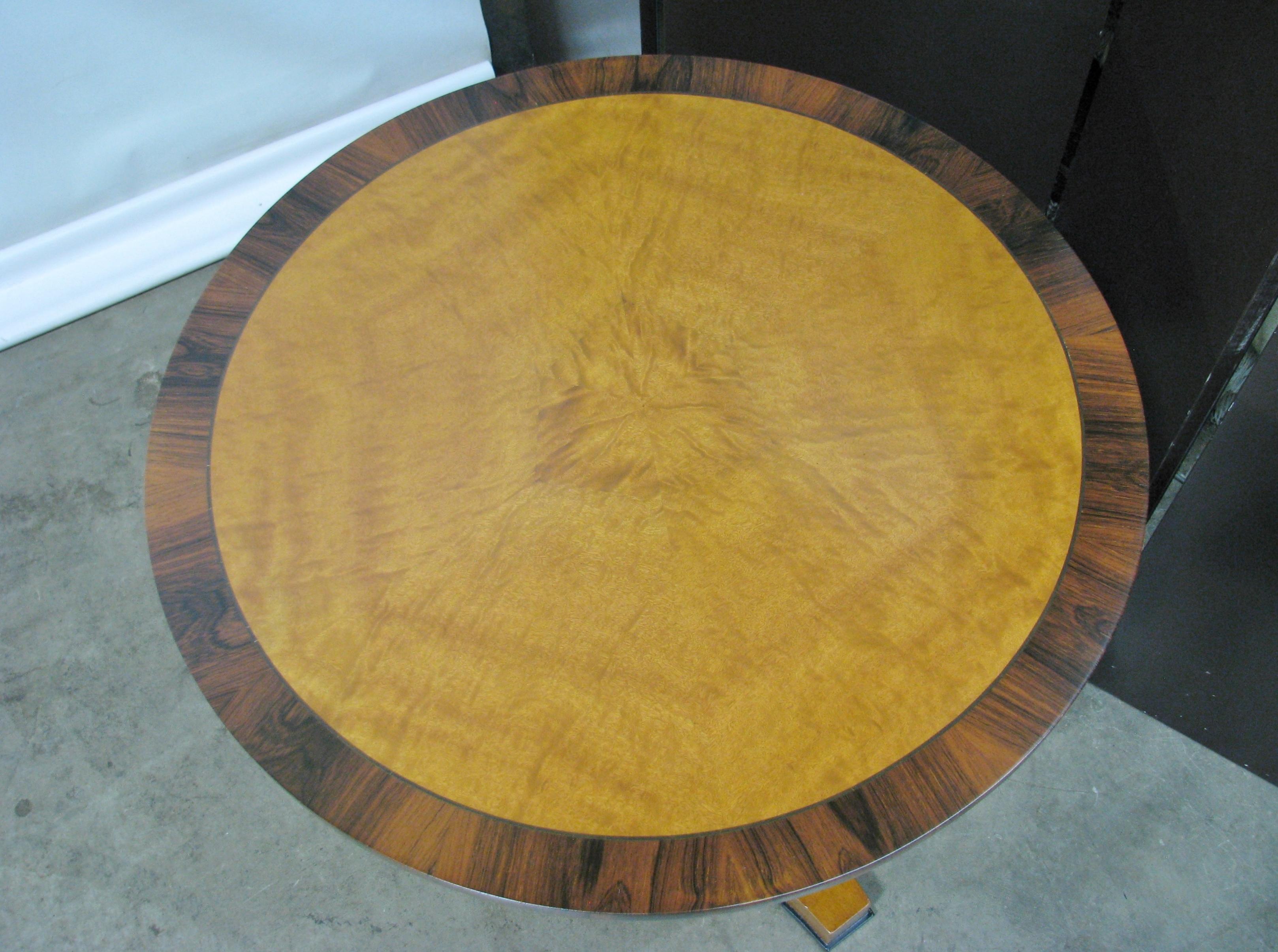 Beautiful, 'heavy', custom made Empire/Biedermeier style round lamp or center table. Executed for the high-end Miami design firm Richard Plumer. It features cherry solids and veneers, with a banded edge on the top of rosewood. Brass ornaments and