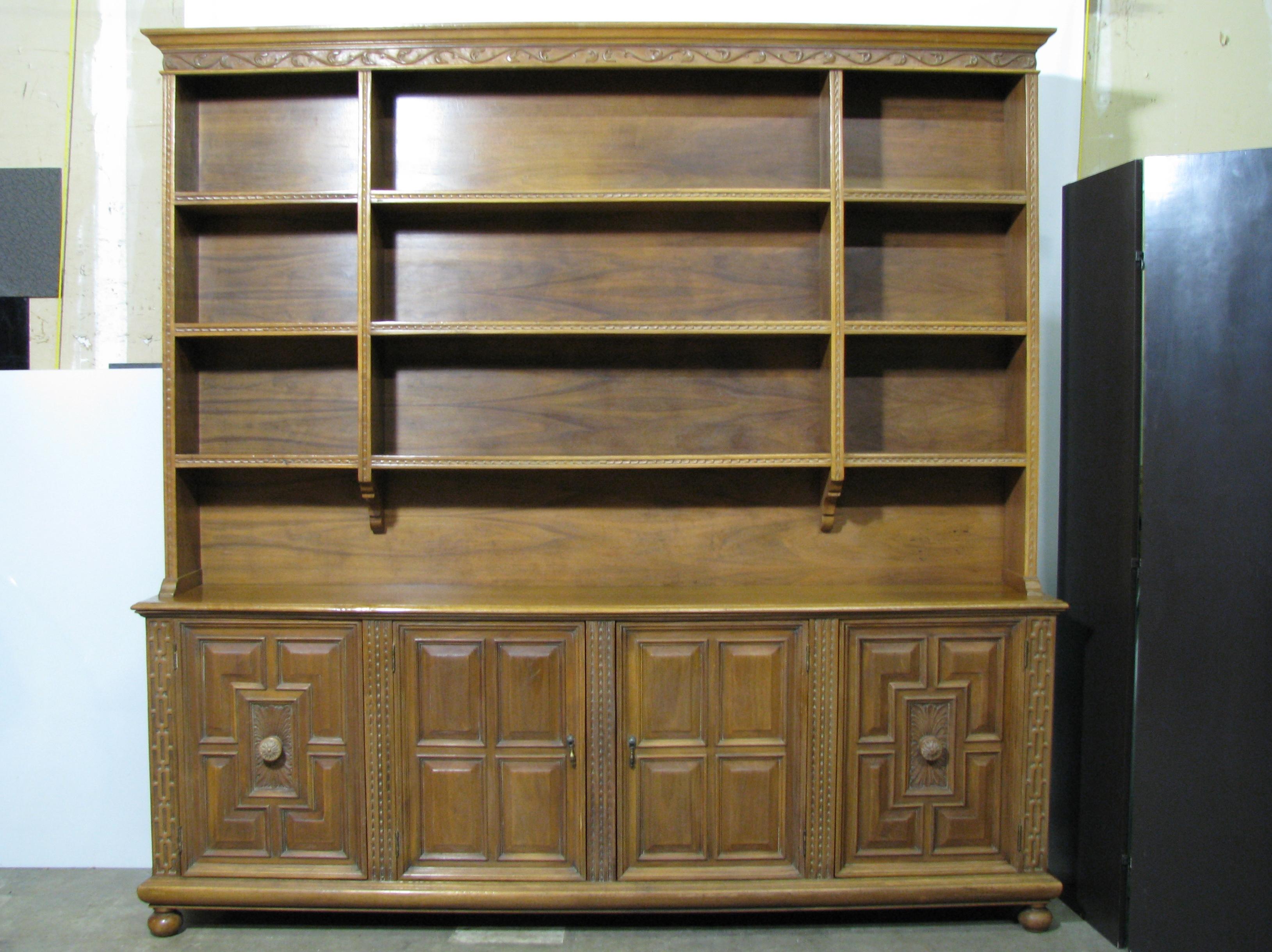 Stunning one-of-a-kind vintage Italian Renaissance style cabinet with upper shelves by custom furniture manufacturer Joseph Milbeck. Milbeck specialized in unique, period-inspired pieces for designers. This piece was designed and created for a home