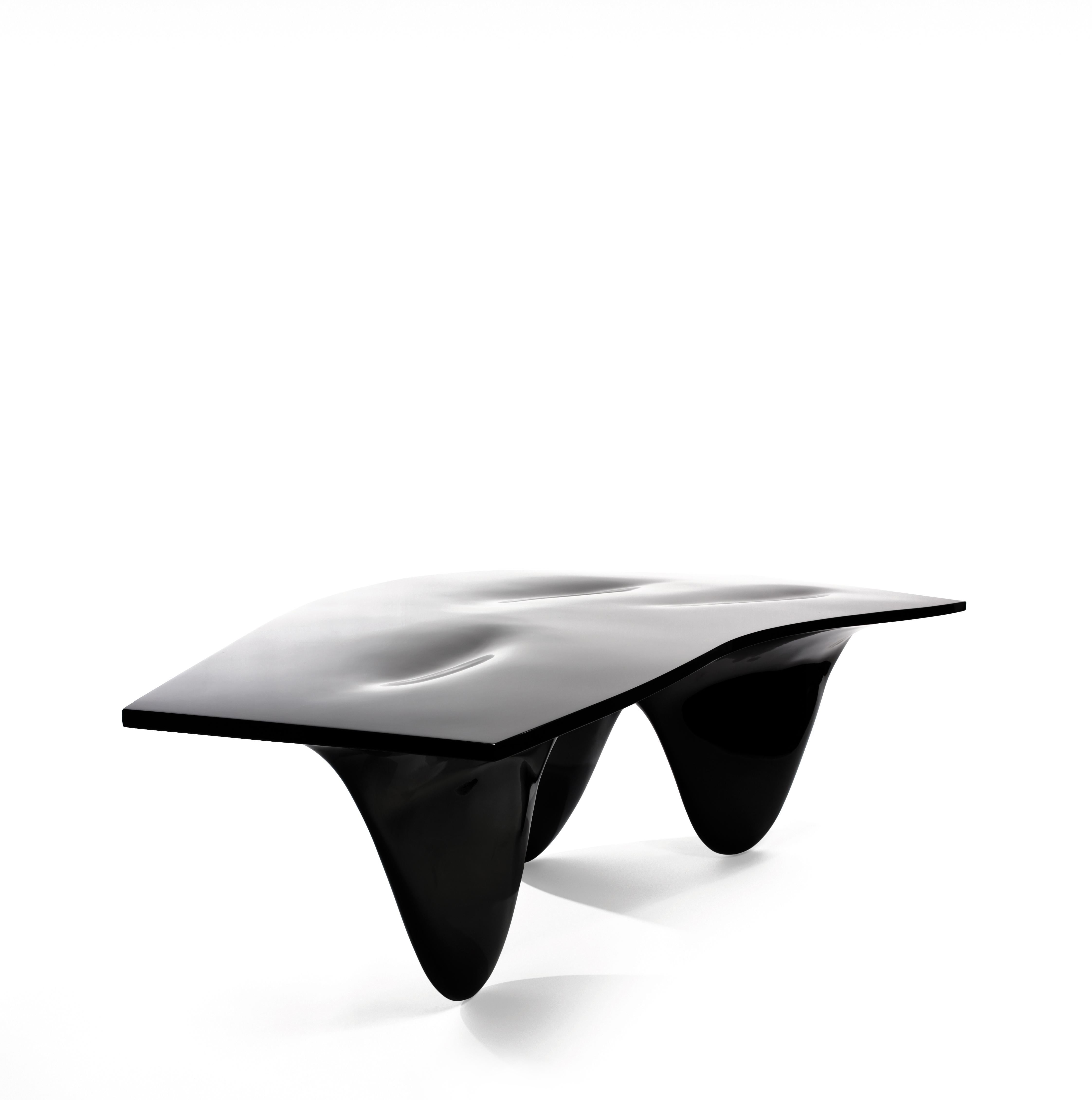 Zaha Hadid’s voluptuous Aqua table is an uninterrupted whole – a curious and curvaceous form that invites viewers to engage with it. Standing as an impressive centrepiece it delivers a stylish focal point in any space. The three fin-like legs of the