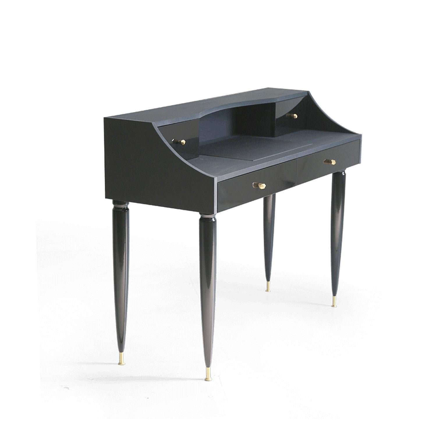 Refined elegance and classic design characterize the Kanttari Writing Desk. The definition of rich furniture design, this beautiful writing desk is handmade with soft to touch black panels and leather top. Luxurious brass accents on handles and legs