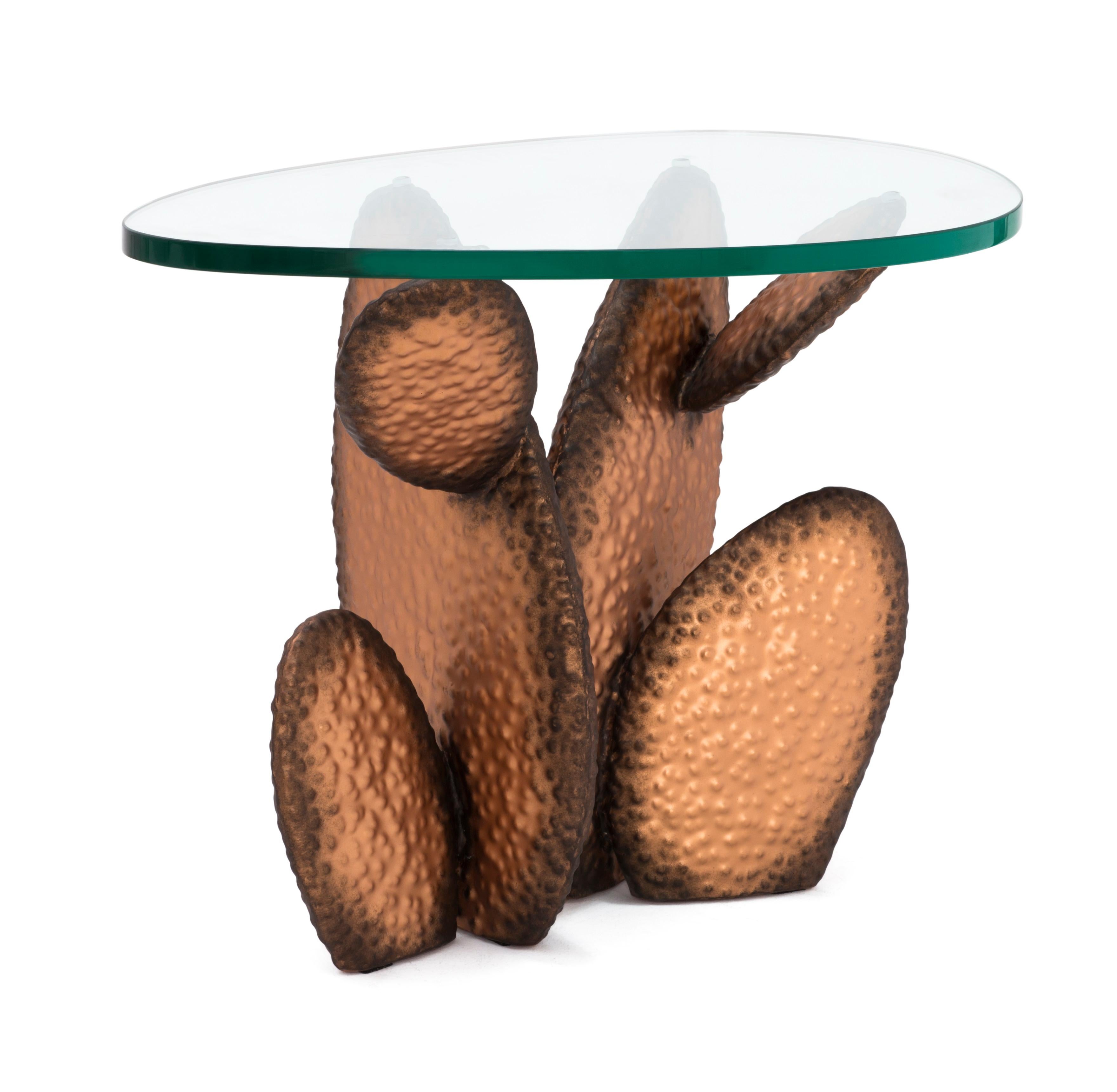 High gobi coffee table by Kenneth Cobonpue.
Materials: Steel. Glass. 
Also available in other sizes. 
Dimensions: 
Glass 45 cm x 66 cm x H 19mm. 
Base 35 cm x 53 cm x H 48 cm.

Inspired by the characteristic form of the cactus, Gobi is a