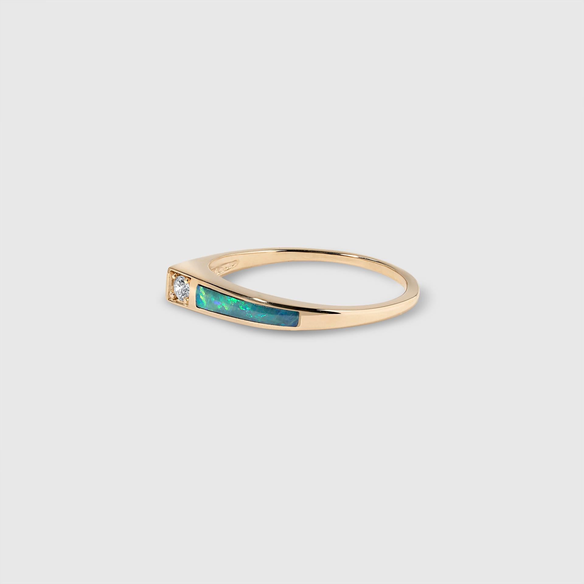 Opal Stacker Ring with Side Diamond Detail, 14kt Yellow Gold, size 7 in stock, custom sizes are available.

All designs may be custom-ordered in many of Kabana’s stones, including: sleeping beauty turquoise, turquoise, four-star opal,