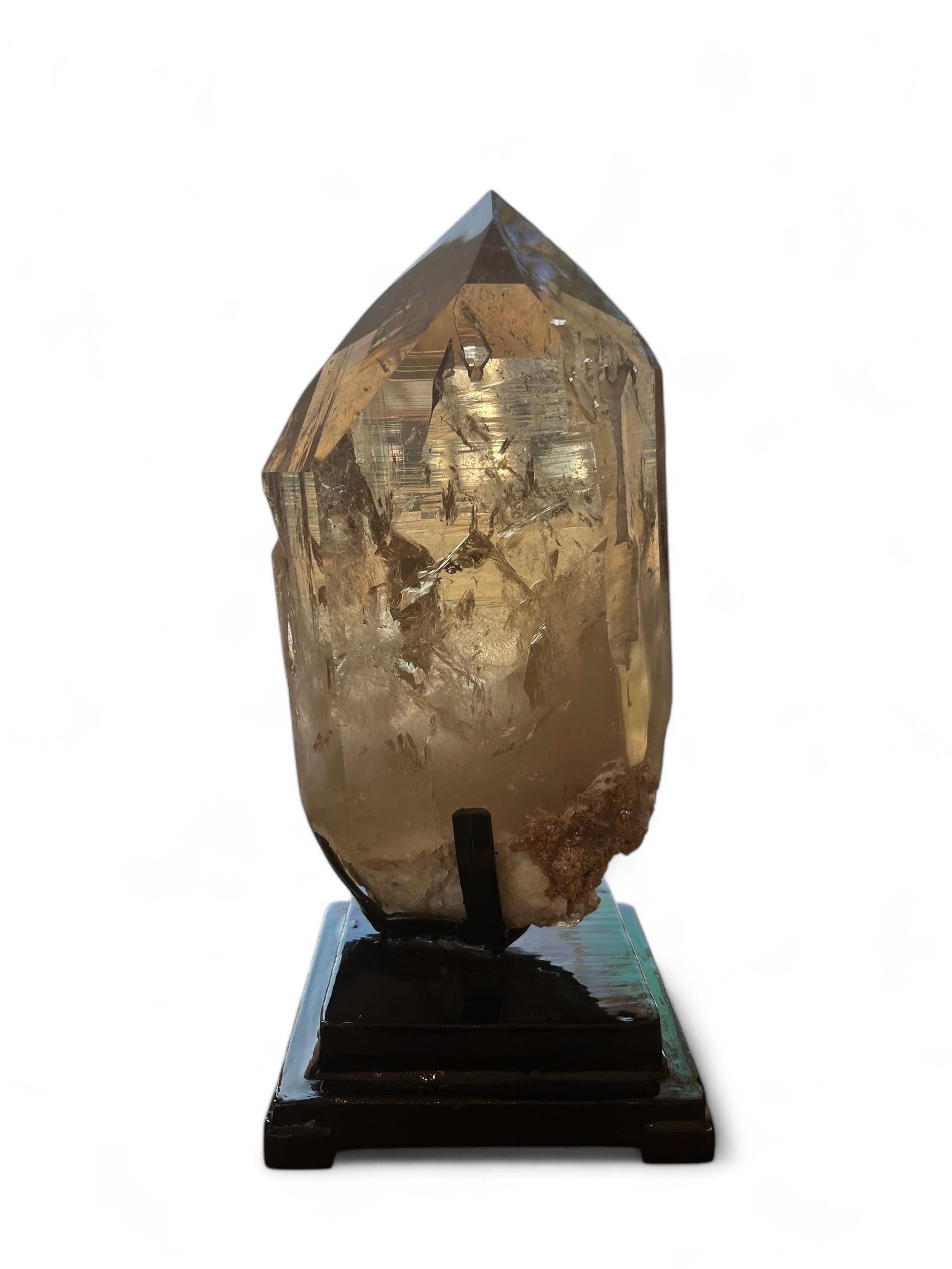 The golden yellow color of this Natural Citrine Tower reveals its beautiful interior. This color is vibrant and can be fully appreciated under sunlight, as well as under a warm yellow light. Crystal Grade: AAA This Citrine is All Natural, Raw,