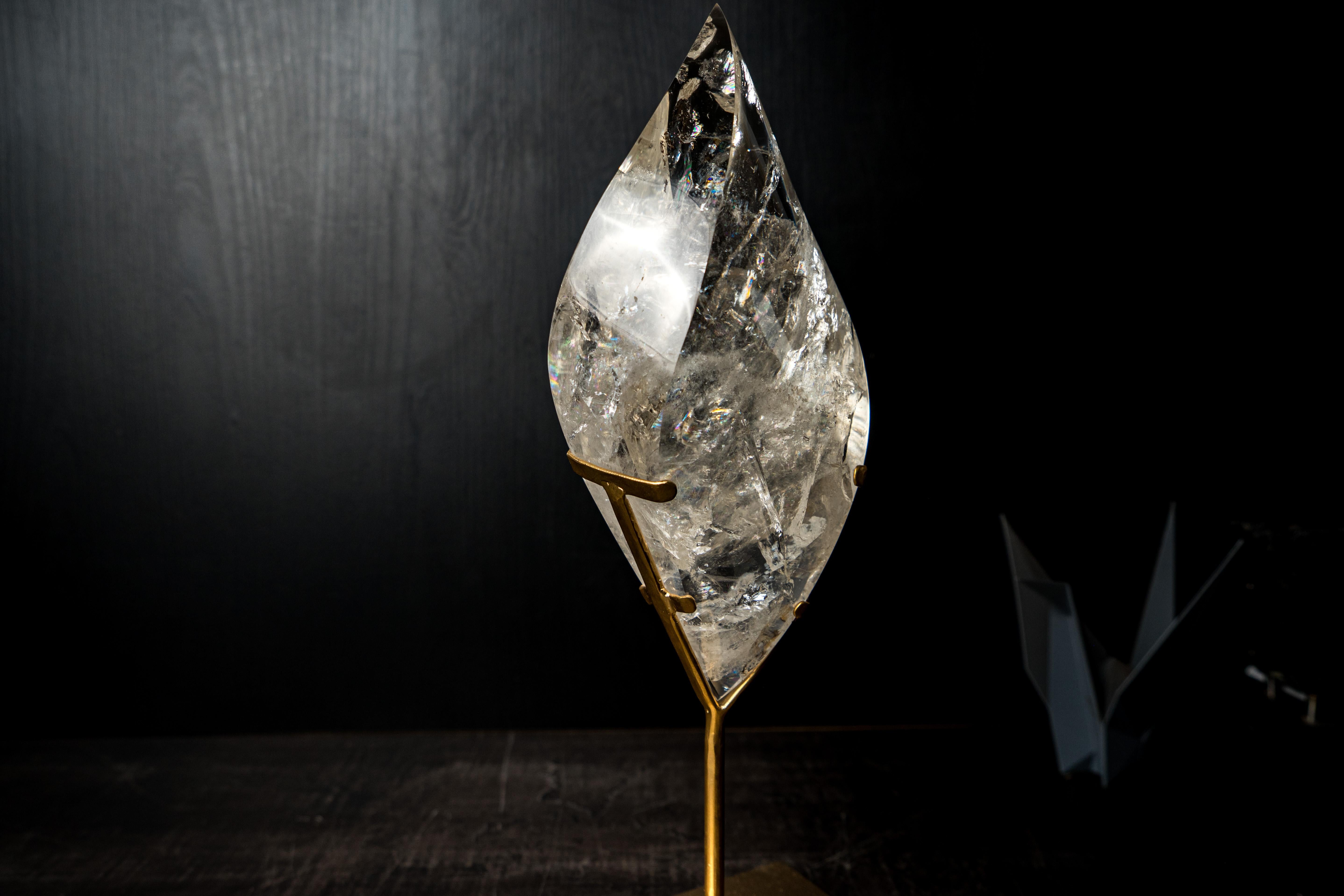 Hand Sculpted Crystal Quartz Flame, AAA-Grade

▫️Description

From a large raw piece of clear quartz, the sculptor shaped delicate, aesthetic lines that give this piece its refined elegance. With a nearly flawless interior, this artistic crystal