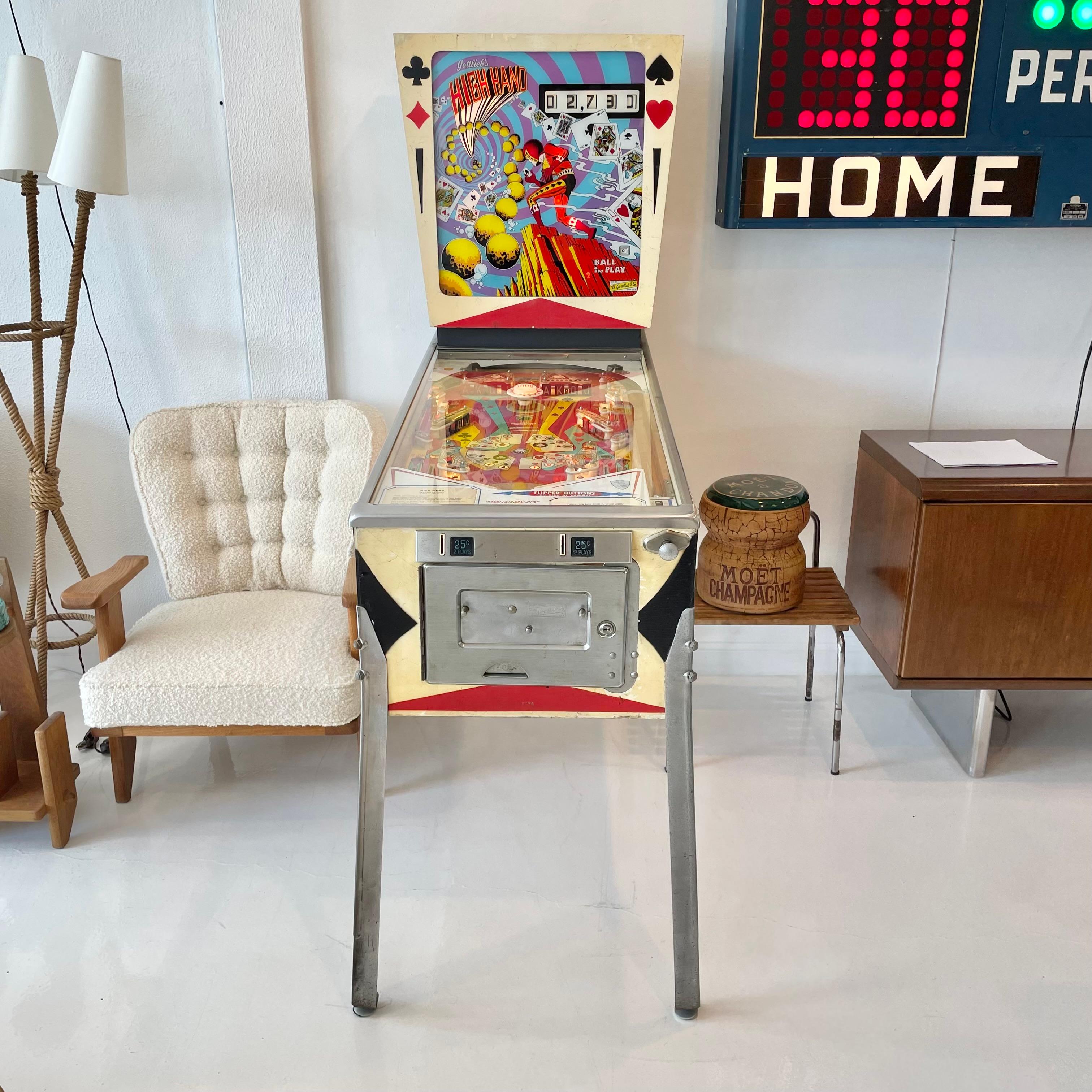 Vintage 'HIGH HAND' pinball machine from 1973. Made by D. Gottlieb & Company and designed by Ed Krynski. In excellent working condition. Great visuals and sounds. Extremely fun paced gameplay. This game features slingshots, drop targets, kick out