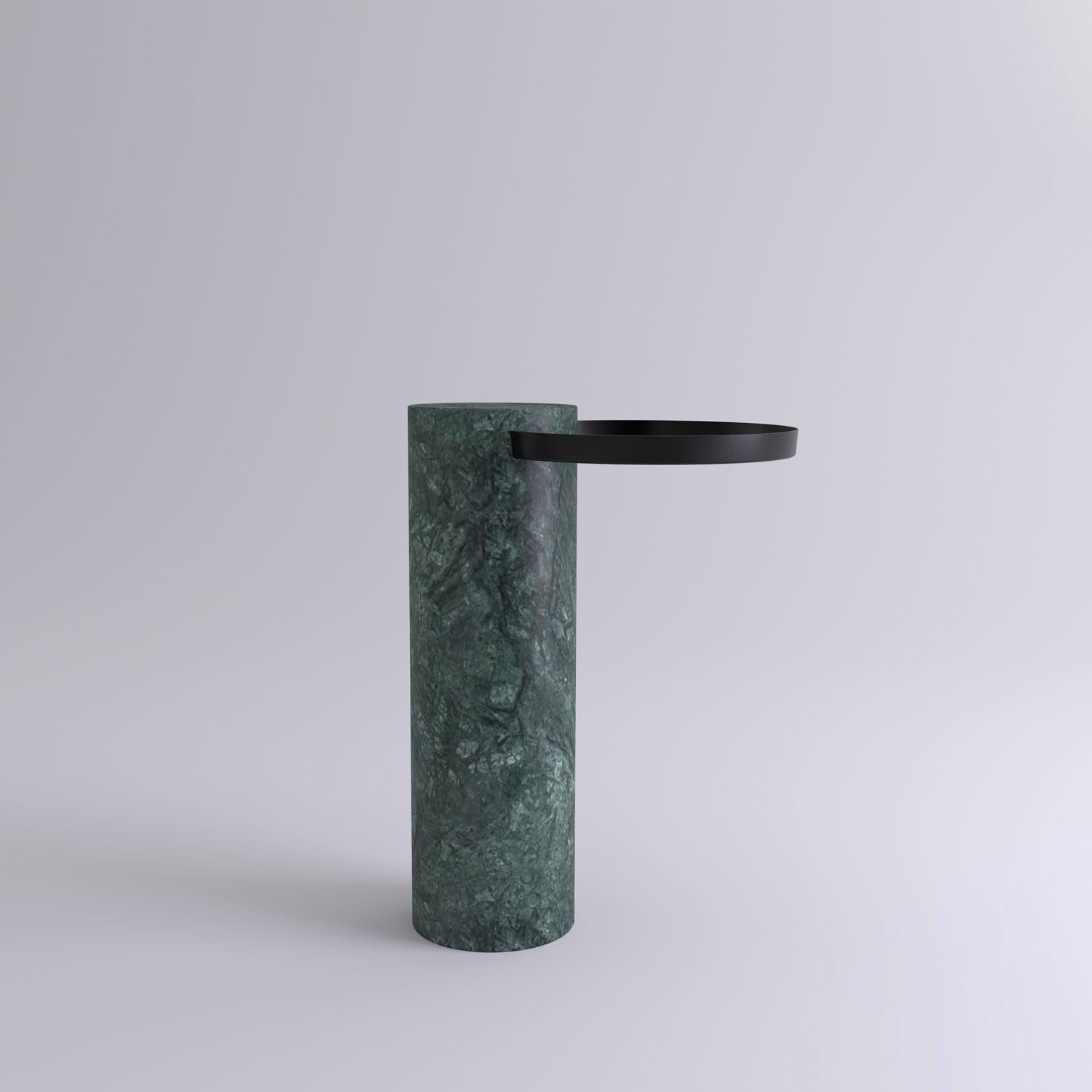 High indian green marble contemporary guéridon, Sebastian Herkner
Dimensions: D 42 x H 57 cm
Materials:  Indian Green marble, black metal tray

The salute table exists in 3 sizes, 4 different marble stones for the column and 5 different finishes for