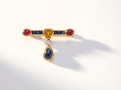 High Jewelry Brooch with Ruby Cabochons, Sapphires, and Brilliant-Cut Diamond