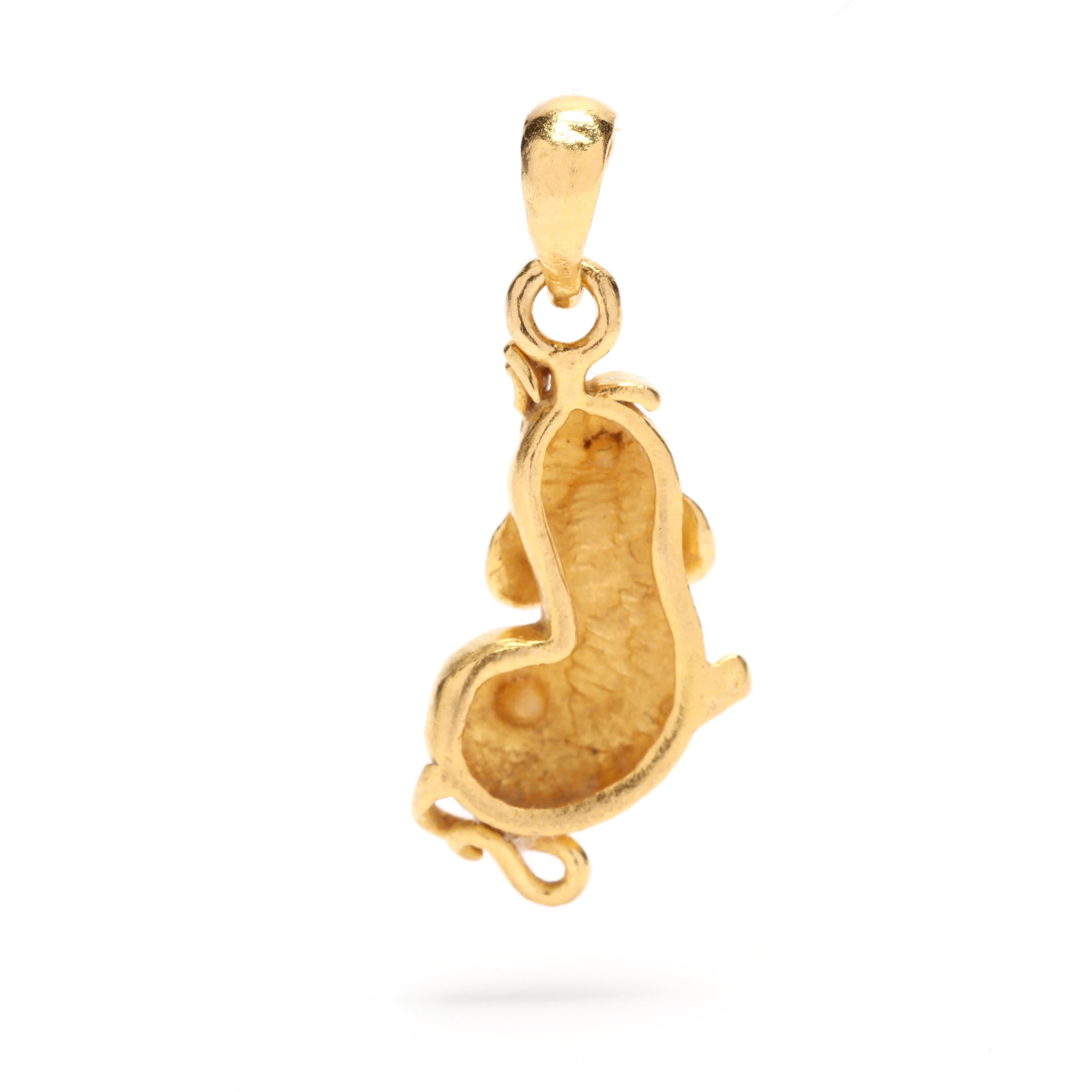 A vintage 22 karat yellow gold mouse charm. This high karat gold charm features a small mouse motif suspended from a thin tapered bail.

Length: 7/8 in.

Width: 3/8 in.

Weight: 1.7 dwts. / 2.64 grams

Metal: 22KT (tested)

Ring Sizings &