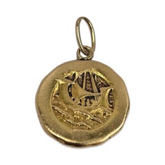 High-Karat Mythological Gold Medallion Pendant — Double-Sided Sculptural Design