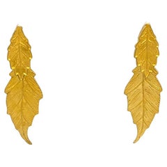 High-Low 18 Karat Yellow Gold Earrings Featuring Leaf Design