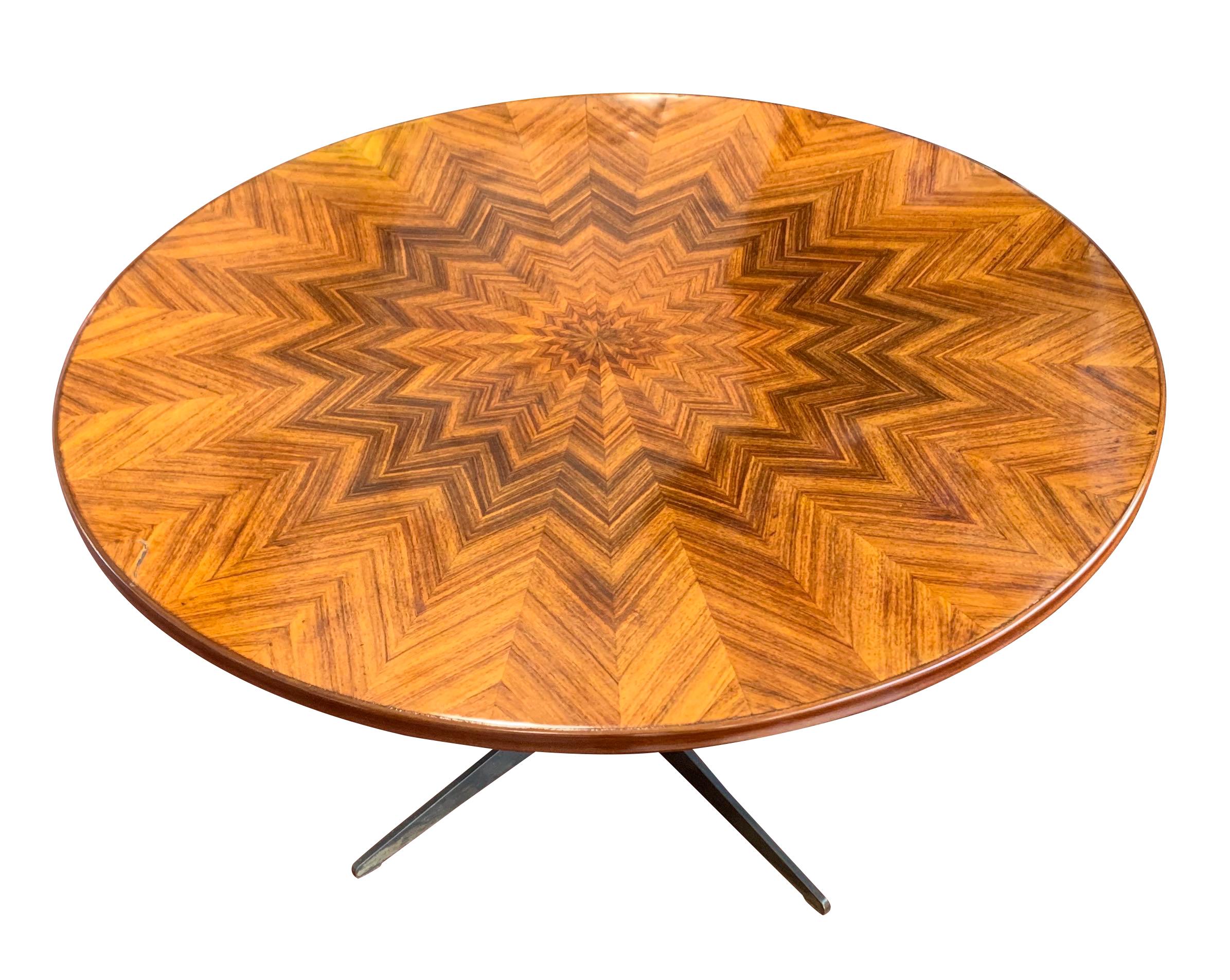 Midcentury Italian table made of a high polish zig zag rosewood
Beautiful patterned top
Steel legs with adjustable brass base
Can be lowered to coffee table height, and adjusted to either side table and/or dining table height
Measures: Lowest