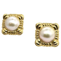 High lustre Mabe pearl earrings in square 14 carat Yellow gold