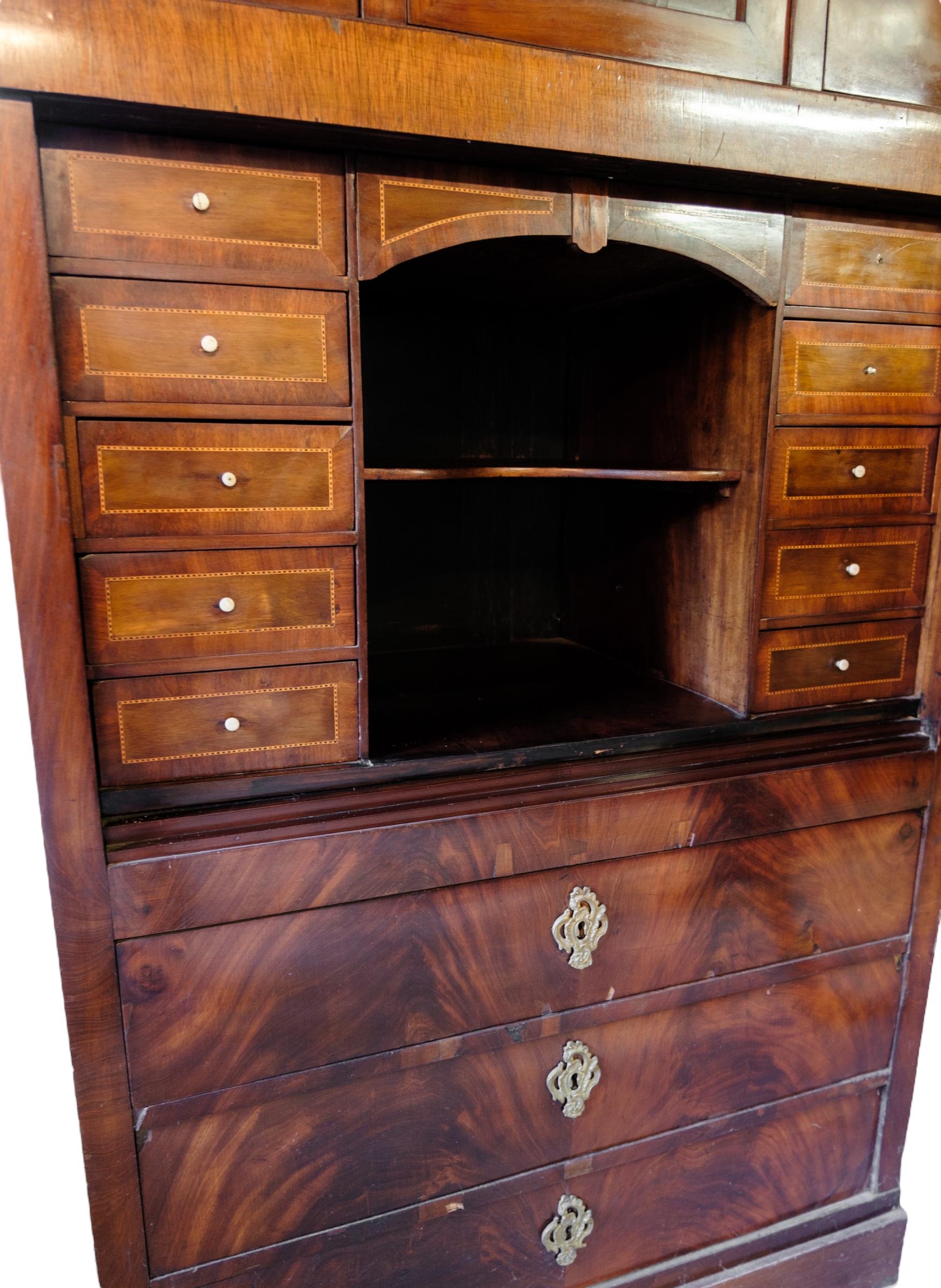 Mahogany High mahogany secretary with marquetry and brass fittings from around the 1840s For Sale