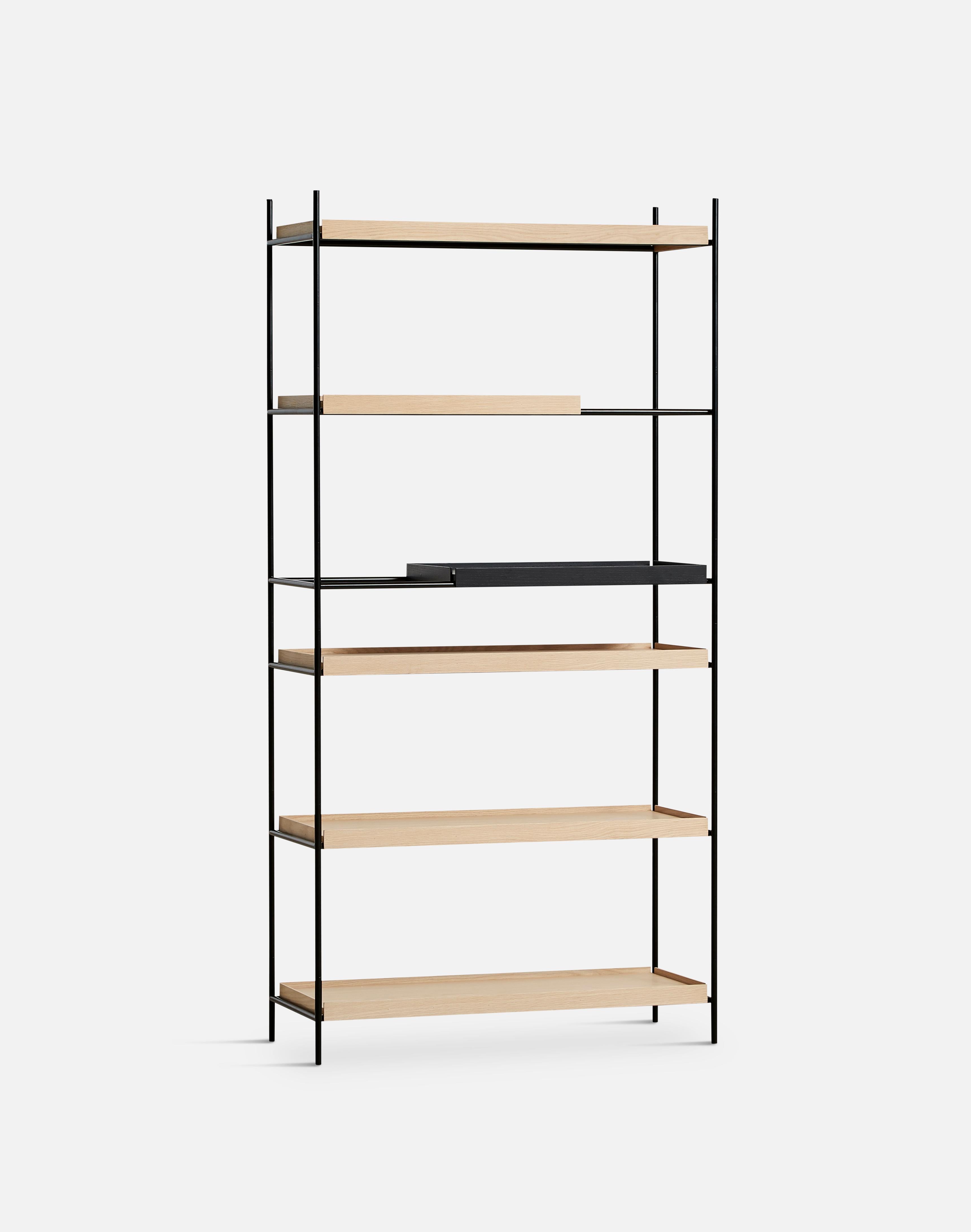 High oak and black tray shelf V by Hanne Willmann
Materials: Metal, oak.
Dimensions: D 40 x W 100 x H 201 cm.
Also available in different tray combinations and 2 sizes: H81, H 201 cm.

Hanne Willmann is a dynamic German designer with her own