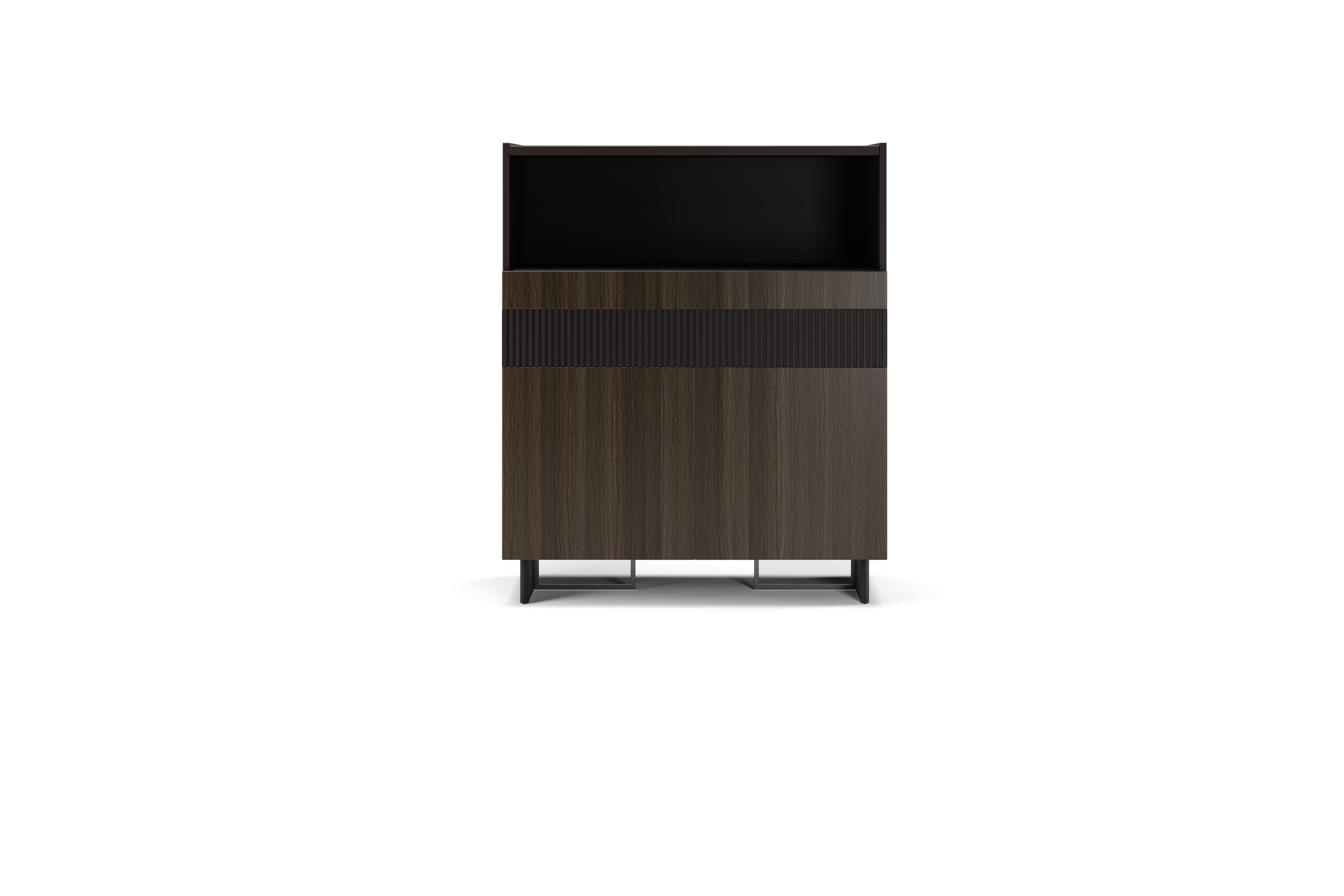 Diana, high sideboard with a veneered smoked gray oak structure. Day compartment, one milled lacquered drawer, one lacquered one and basement in metal frames covered in leather.

Diana is part of the 