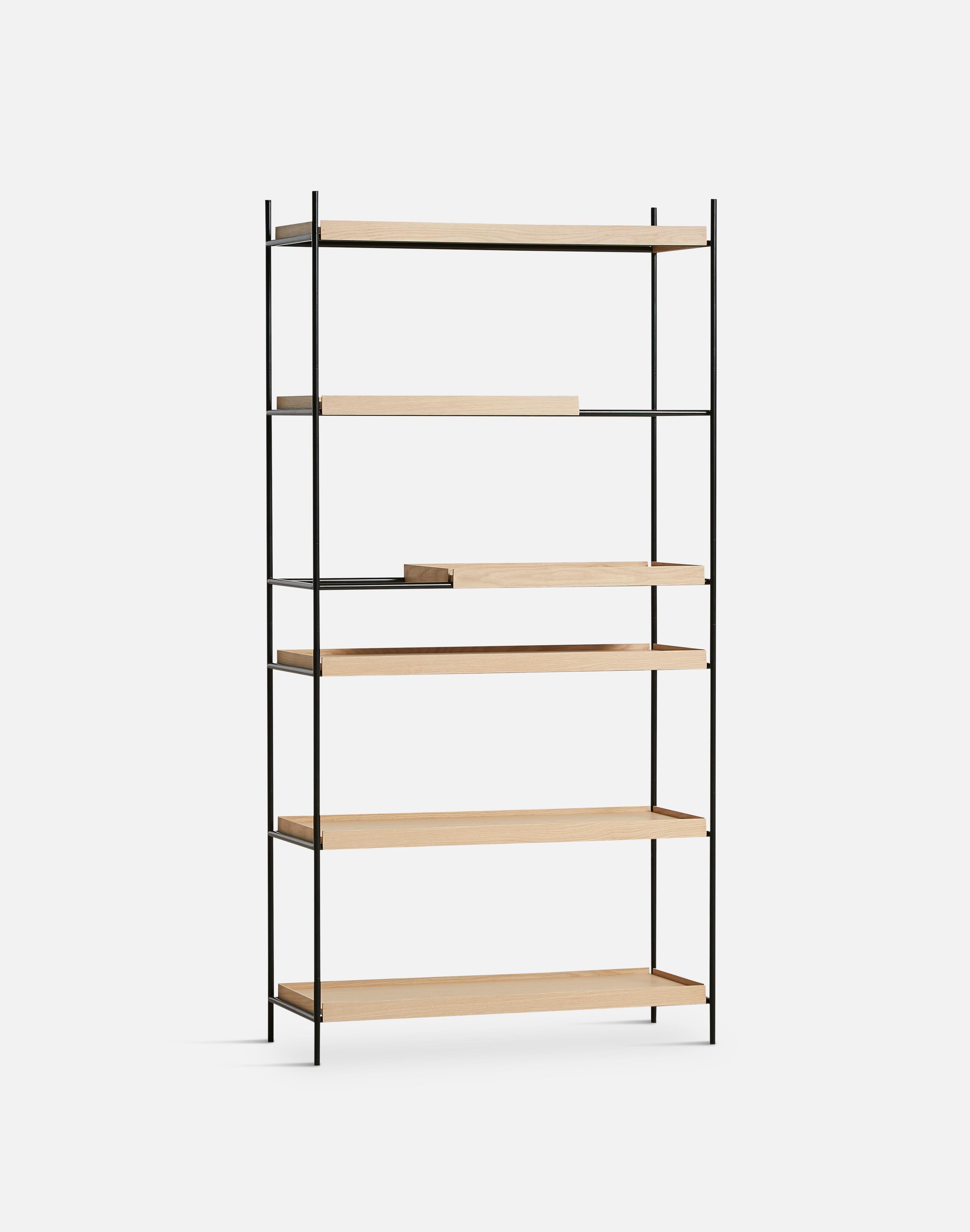 High oak tray shelf by Hanne Willmann
Materials: metal, oak.
Dimensions: D 40 x W 100 x H 201 cm
Also available in different tray conbinations and 2 sizes: H81, H 201 cm.

Hanne Willmann is a dynamic German designer with her own