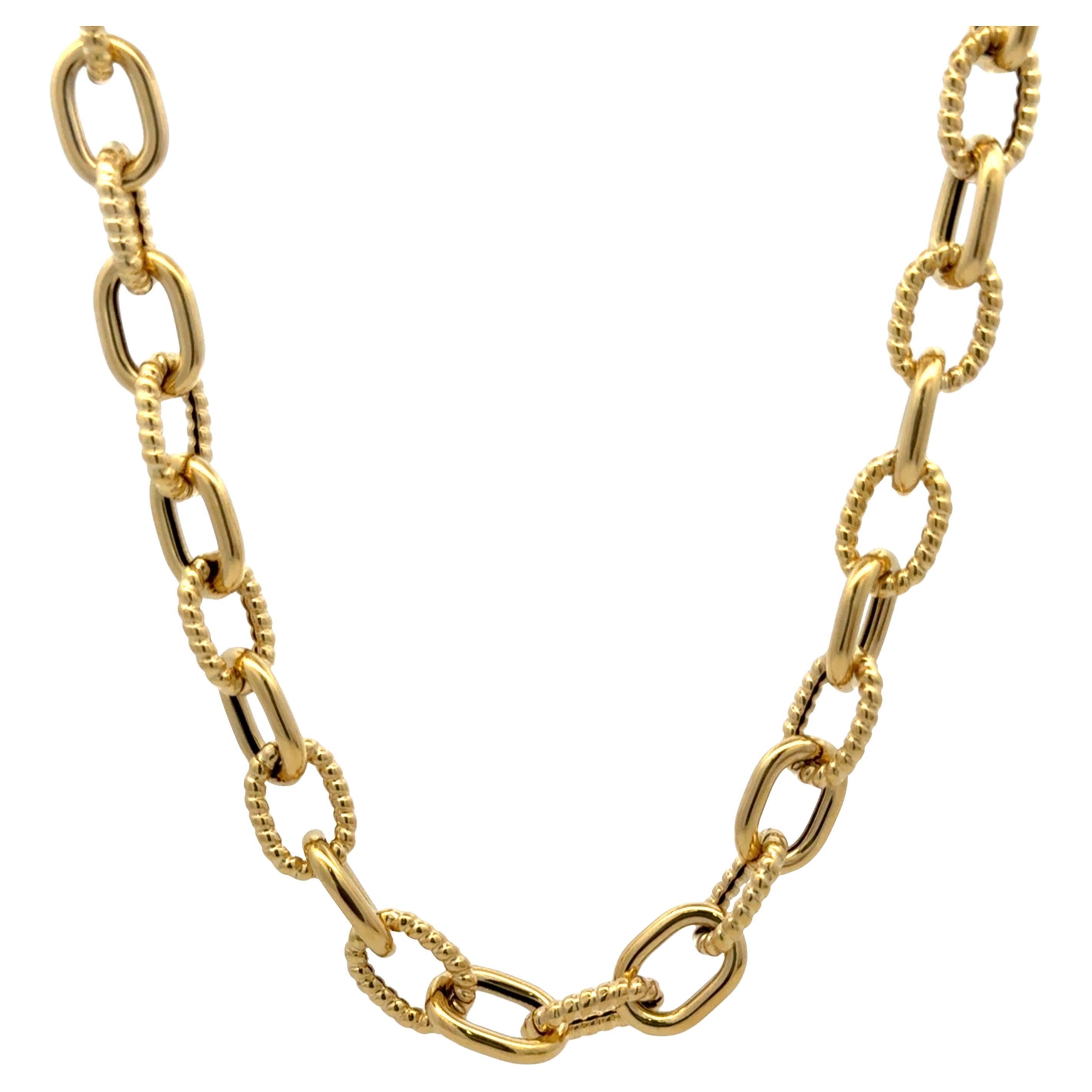Bracelet à maillons ovales à motifs polis et torsadés de 8,08 grammes en or jaune 14 carats Pour femmes en vente
