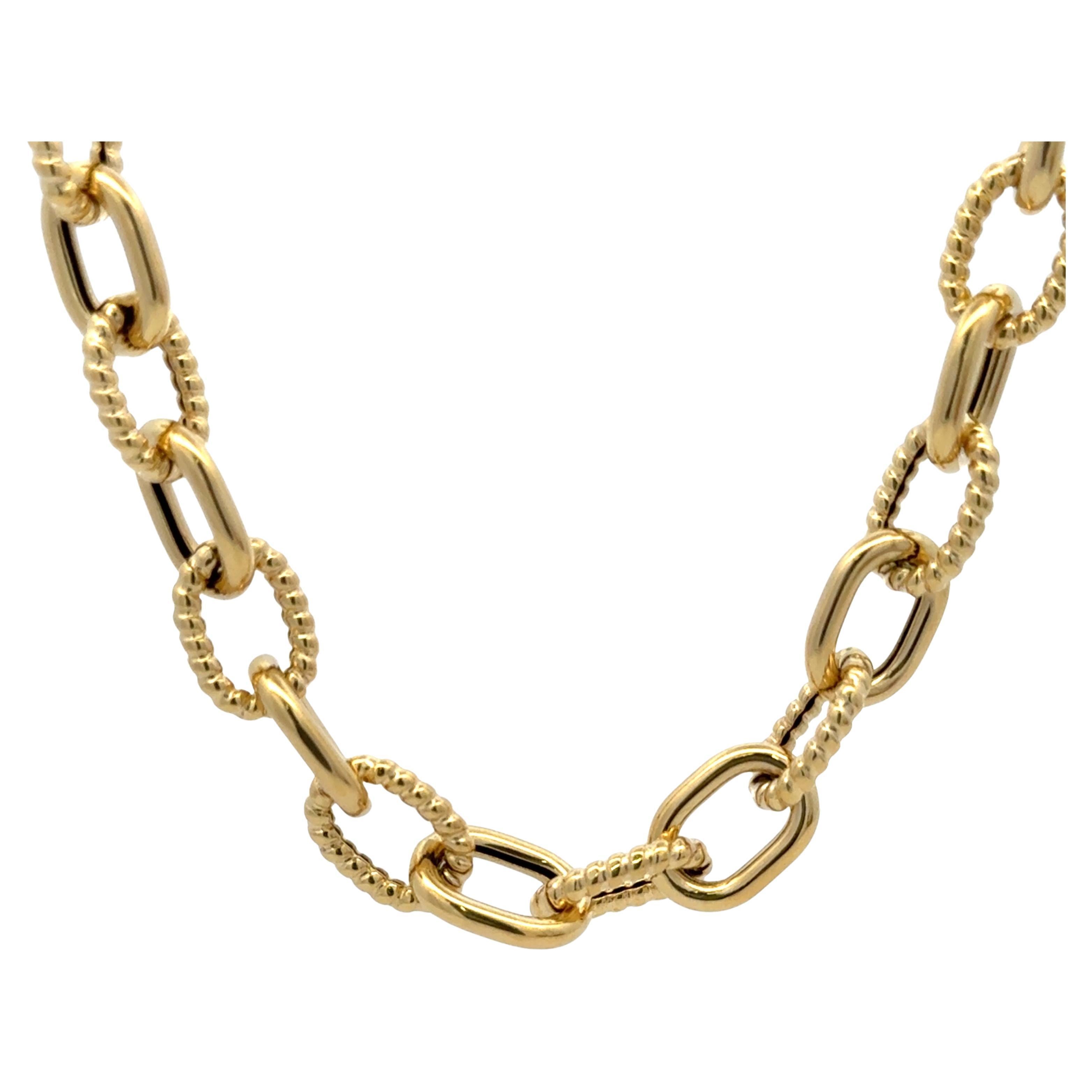Bracelet à maillons ovales à motifs polis et torsadés de 8,08 grammes en or jaune 14 carats en vente 1