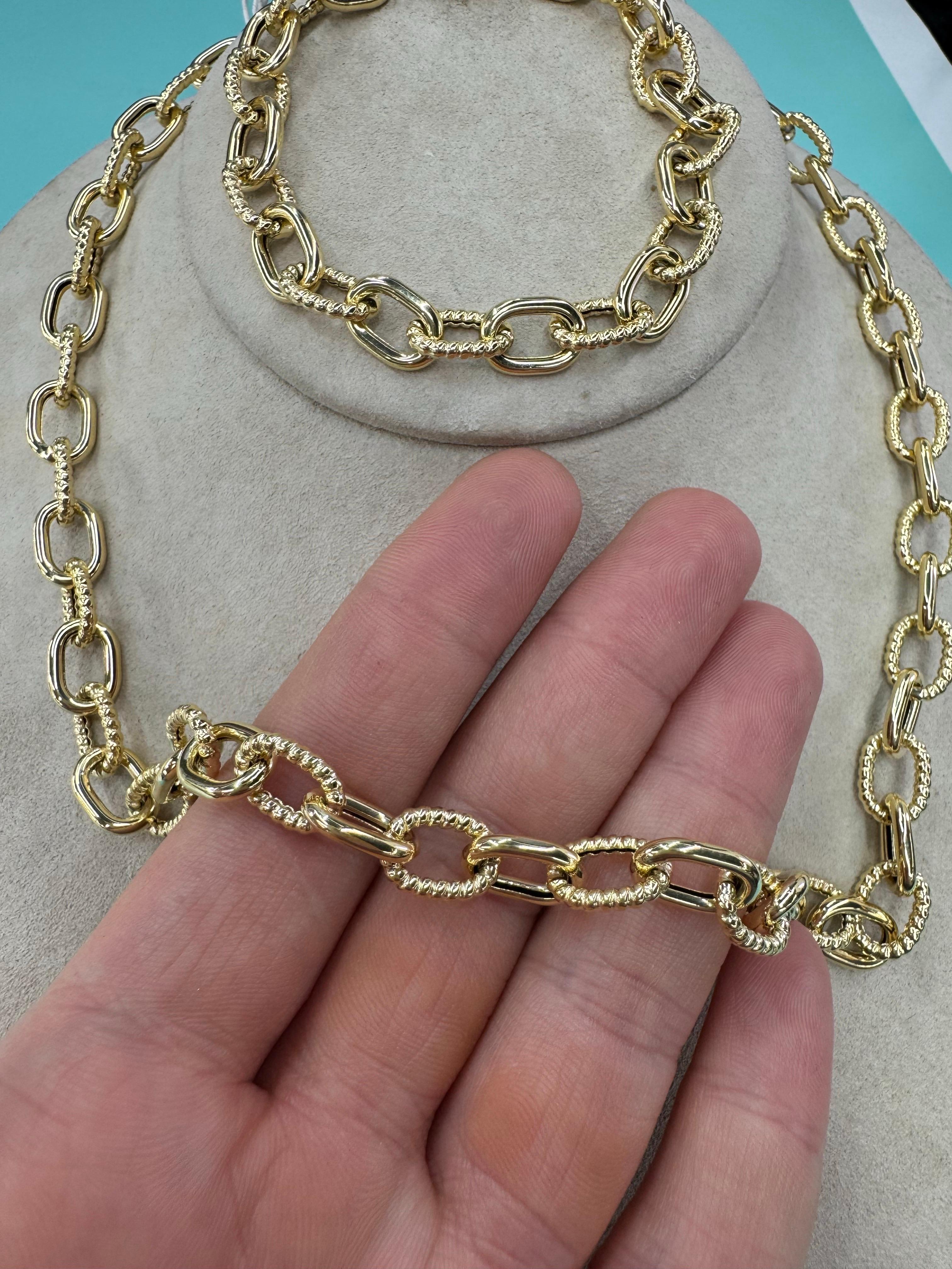 Bracelet à maillons ovales à motifs polis et torsadés de 8,08 grammes en or jaune 14 carats en vente 2