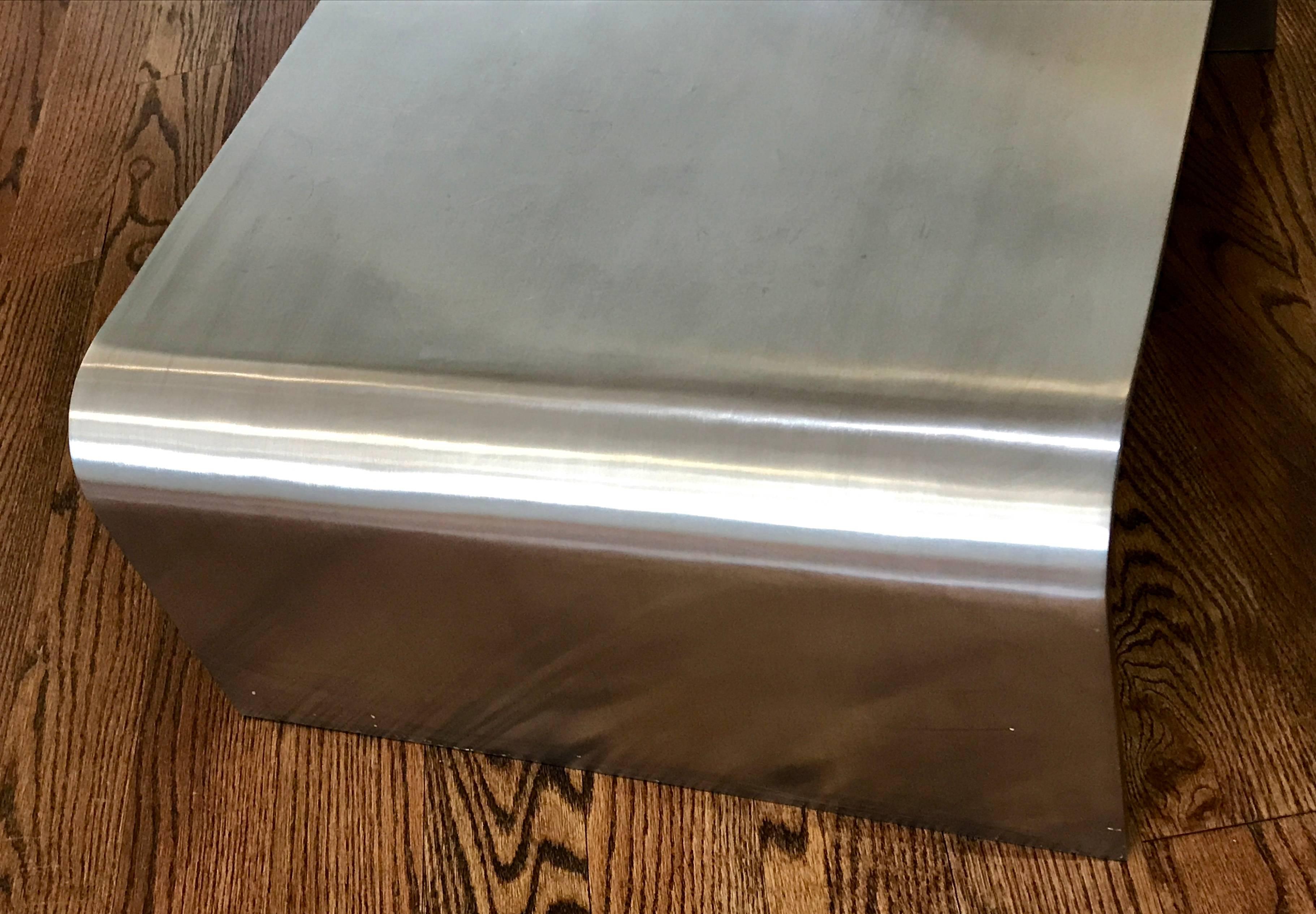 Streamlined Moderne High Polished Metal Streamline Modern Waterfall Coffee Table, Late 20th Century