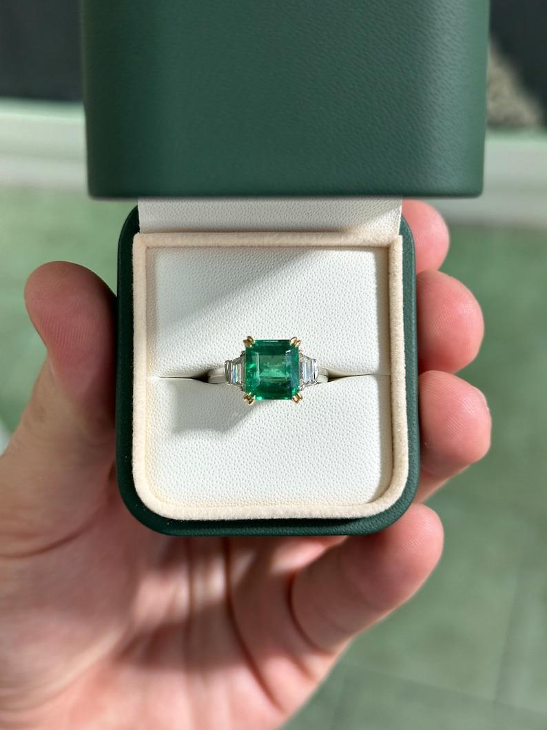 High-Quality 4.85tcw Asscher Cut Emerald & Diamond Three Stone Ring in 18K In New Condition For Sale In Jupiter, FL