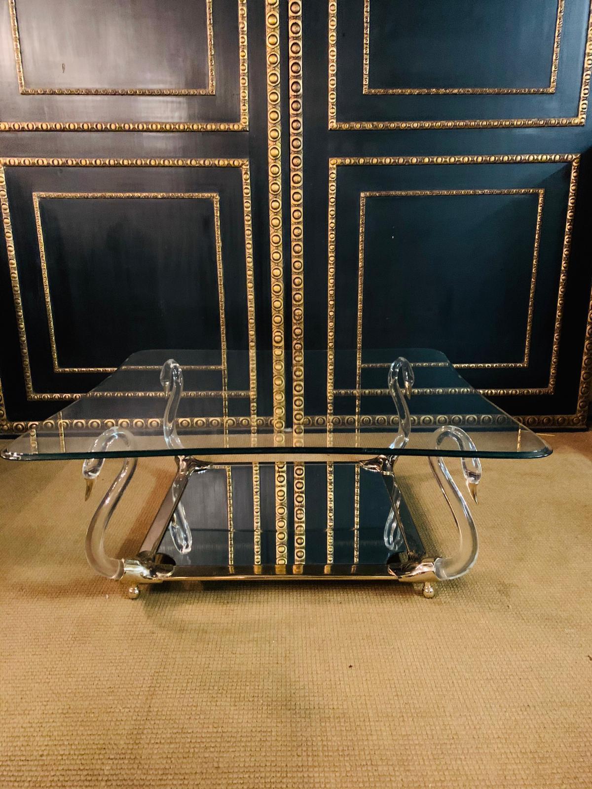 Modern High Quality Acrylic Coffee / sofa Table with 4 Carrying Swans and big glass top For Sale