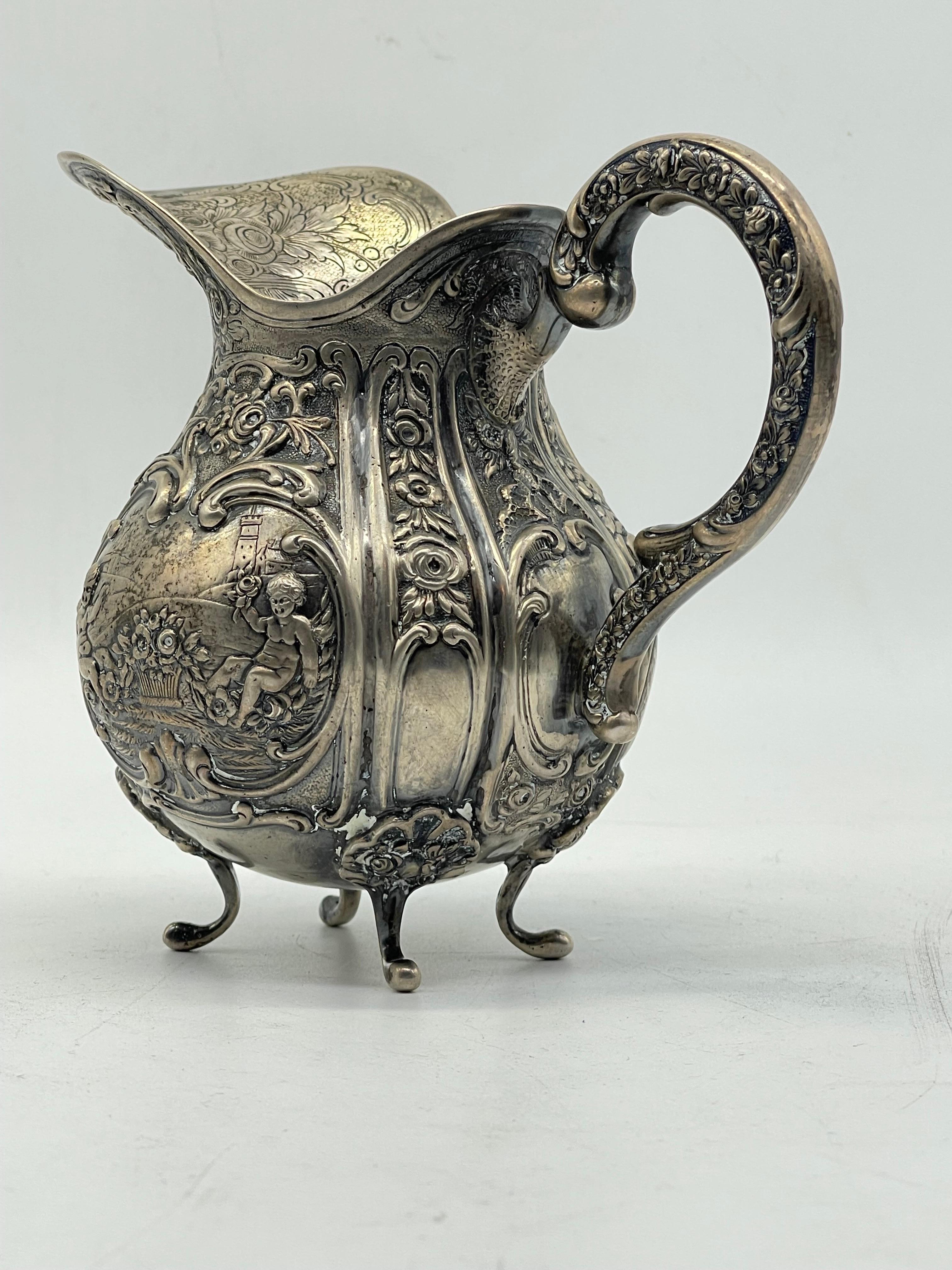 Hochwertige antike 800er Silber-Milchkrug mit Blumen und Kindern, wahrscheinlich deutsch (19. Jahrhundert) im Angebot