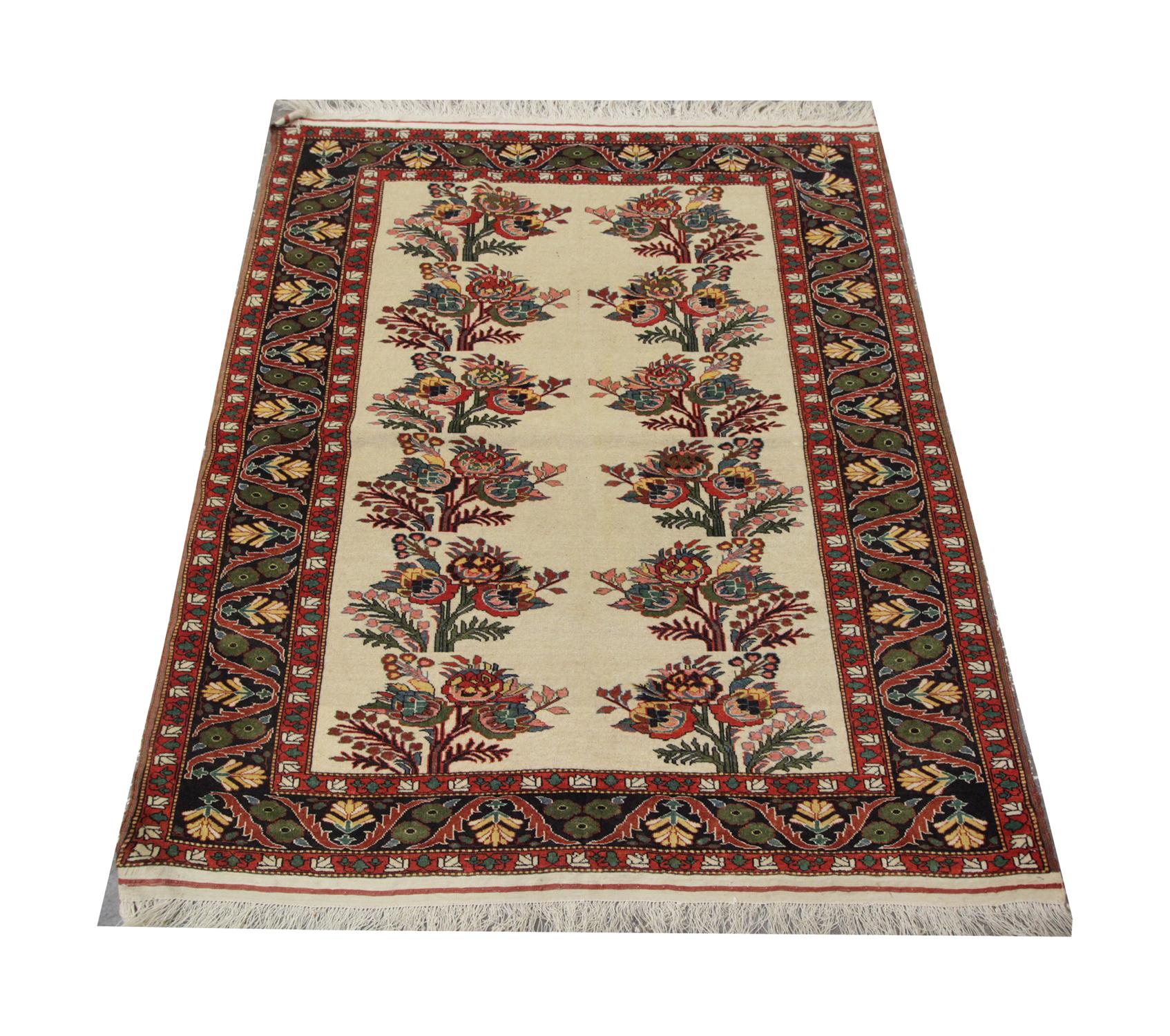 This luxurious realistic repeat pattern design rug was woven in Azerbaijan. It features 12 detailed botanical bouquets in rich pink-red and cream colors on a subtle beige background. The vibrant layered repeat pattern border encloses this design and