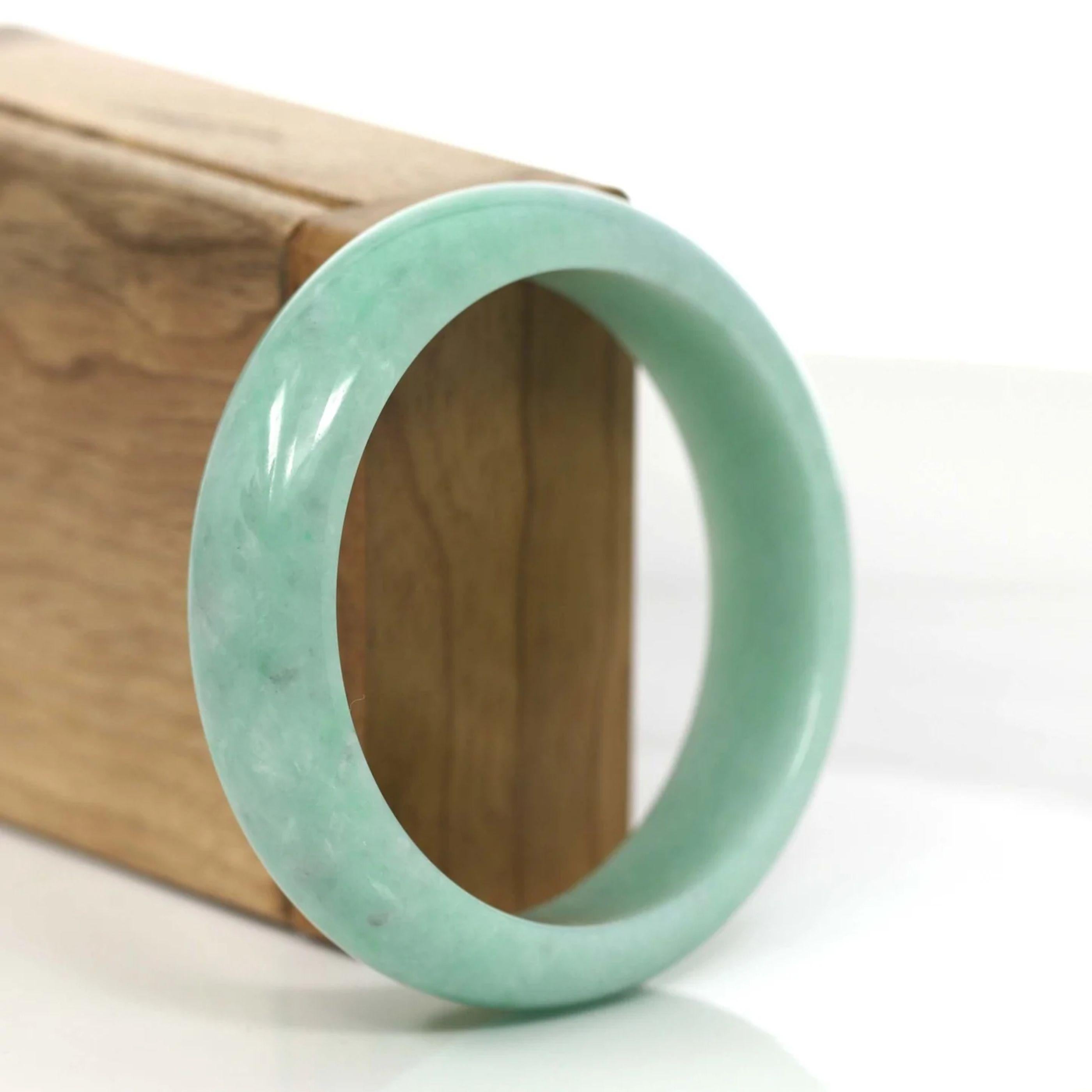 * DETAILS---This bangle is made with very high quality genuine Burmese Jadeite jade. The jade texture is very smooth and translucent with even apple green color through out. This is a luxury and perfect bangle. The Classic half-round comfort wider