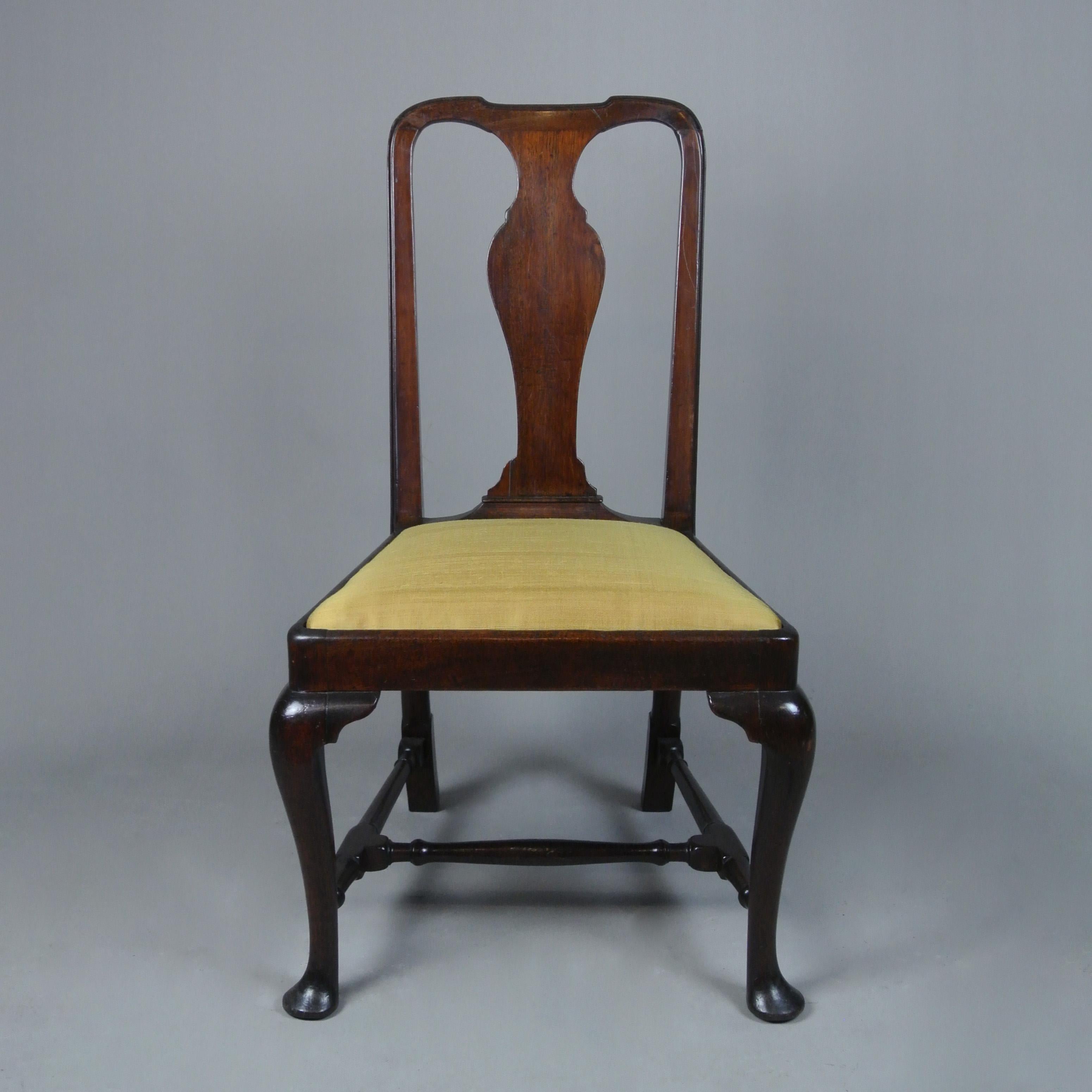 A really beautiful English side chair c. 1740 with well proportioned and completely original frame, the curved splat was a very difficult element to carve and demonstrates a skilled maker.  This is a high quality detail as are the ring turned