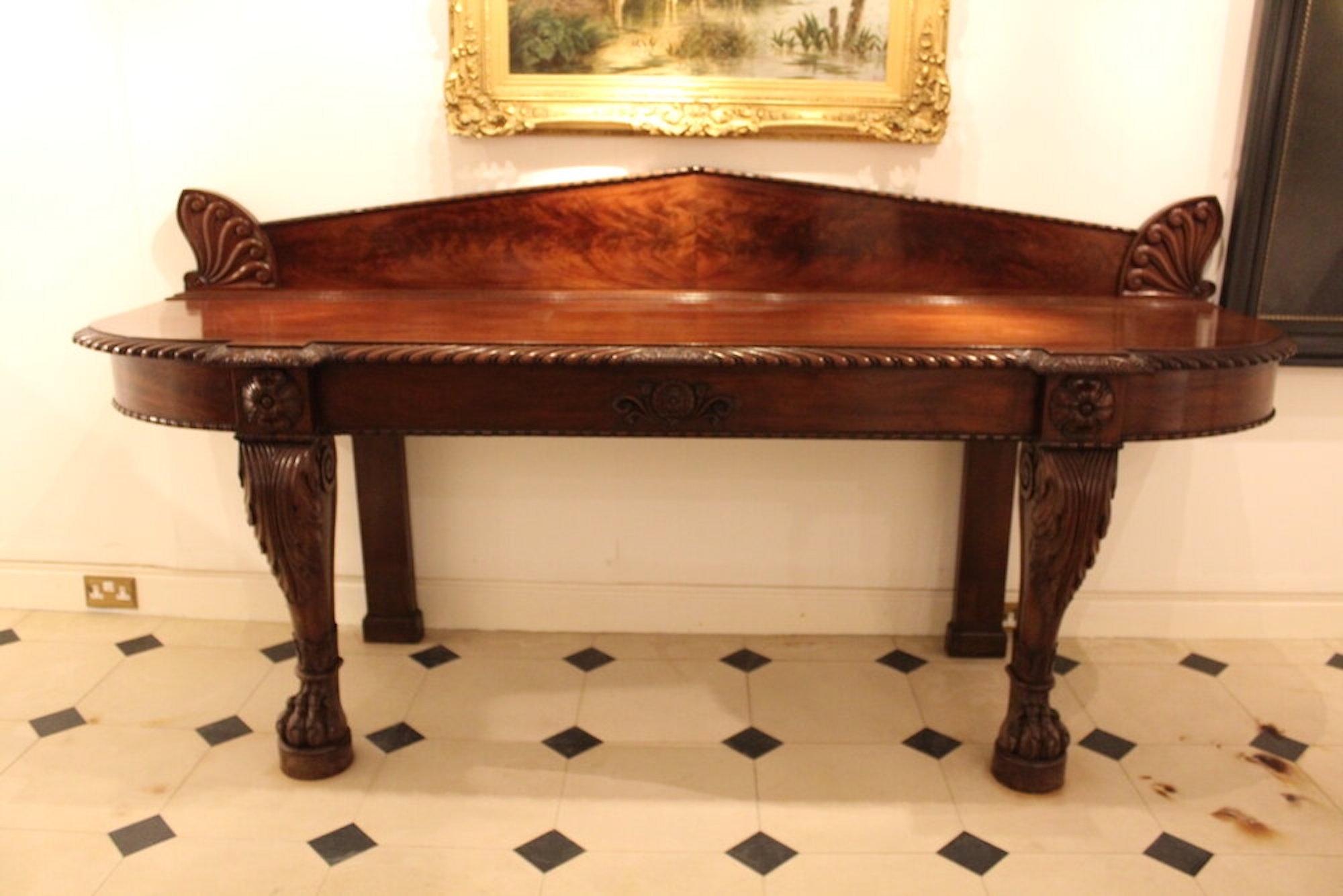 A high quality large scale mahogany serving table

A Large scale Mahogany serving table with heavily carved legs and feet possibly Irish. Circa 1840 in excellent original condition and colour.

Large shape and size 

Period: 19th
