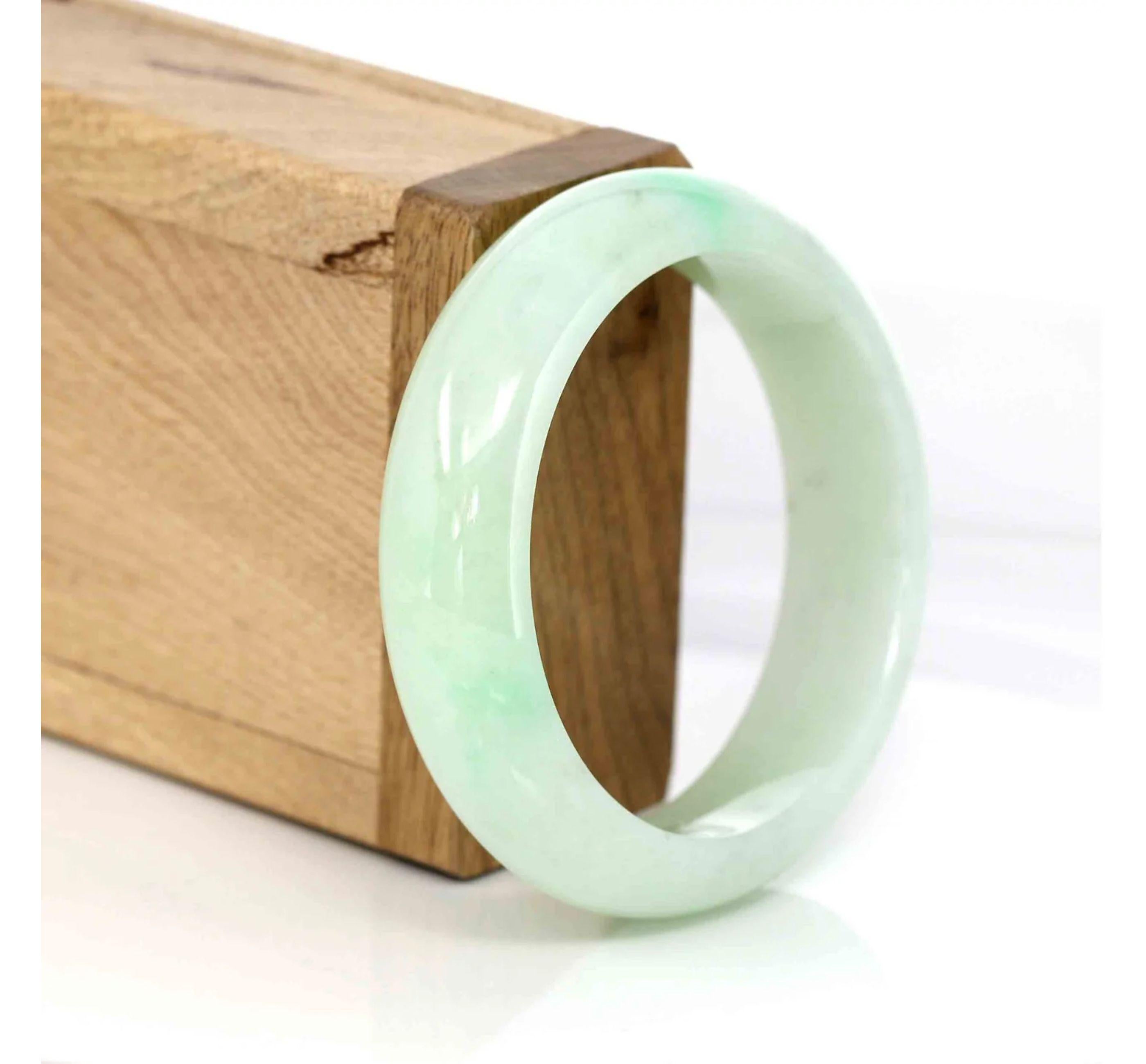 * DETAILS--- This bangle is made with fine genuine Burmese Jadeite jade. The jade texture is very good and smooth with light green. and looks very clear with whole light green color. It's a perfect wider bangle with half-round comfort style