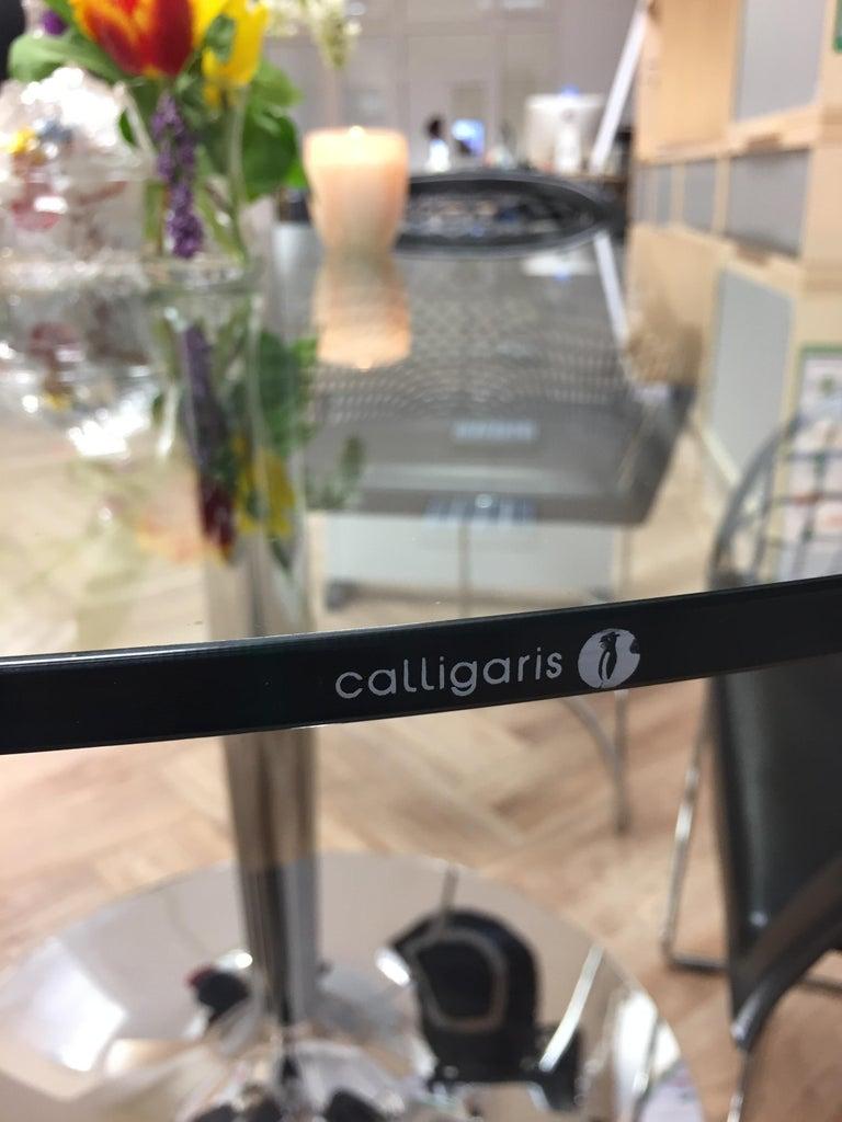 Moderner runder Glastisch von hoher Qualität mit Chromfuß der Marke Calligaris im Angebot 11