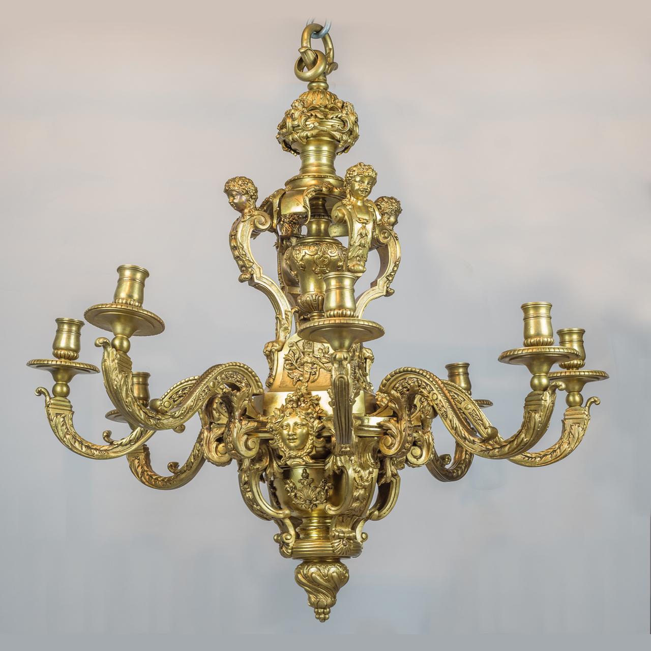 About

An exceptionally stunning, high quality of Regence style gilt bronze, eight-light chandelier with spreading ring turned stems mounted with female figural terms, above eight C-scrolled supports with mask terminals and garlands.

Origin: