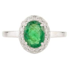 Bague de fiançailles halo d'émeraudes ovales de haute qualité en or blanc massif 14 carats