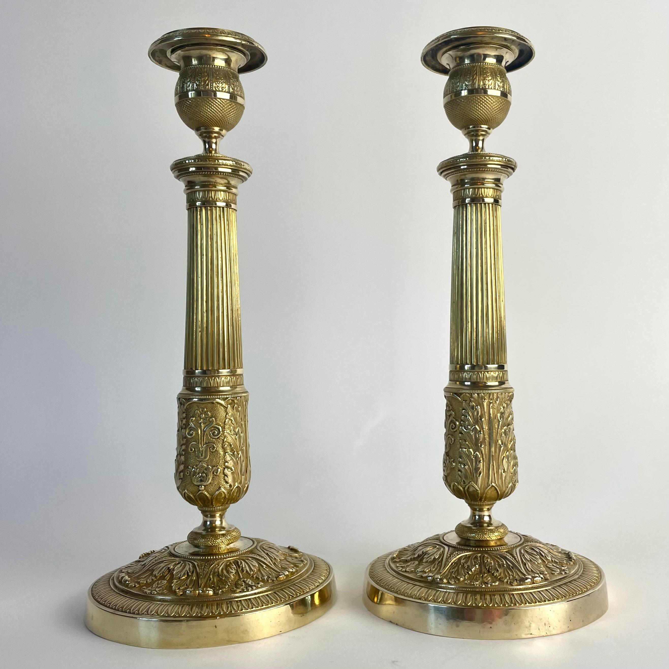 High-Quality Pair of Empire Gilt Bronze Candlesticks, France, 1820s

An exquisite pair of Empire candlesticks in finely chiseled gilt bronze, likely crafted in Paris during the 1820s. These tall and elegant candlesticks display exceptional