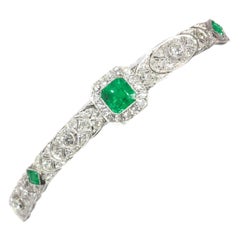 Antique High Quality Platinum Art Deco Bracelet with 140 Diamonds and Natural Emeralds