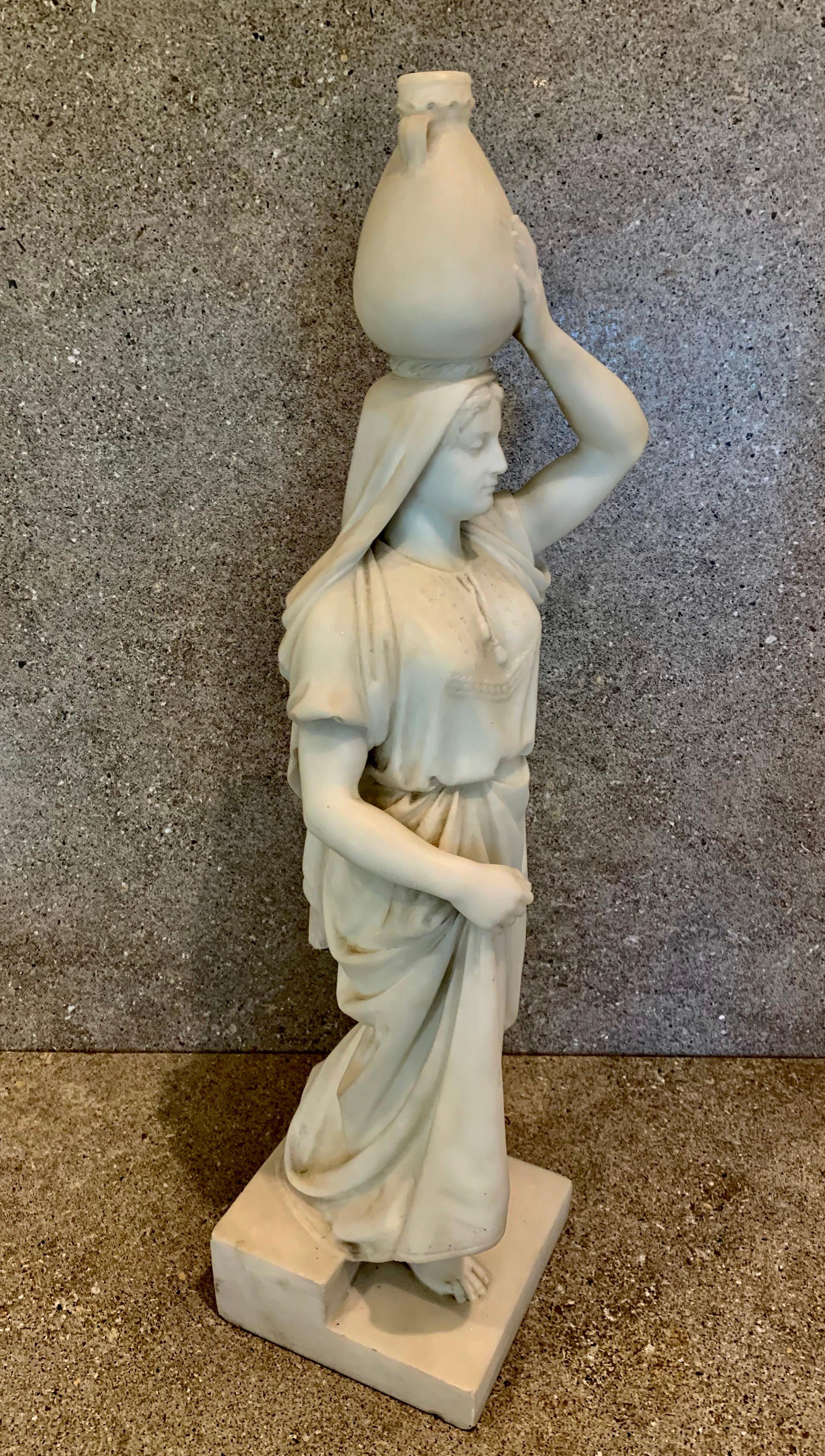 Large white marble figurine
Signed on the base:
C PAULUS SCULPTOR JERUSALEM 1882
Circa late 19th
Stepped marble base
25 in. (66.5 cm.) high by 6 1/2 in (16.5cm) square the marble base size.