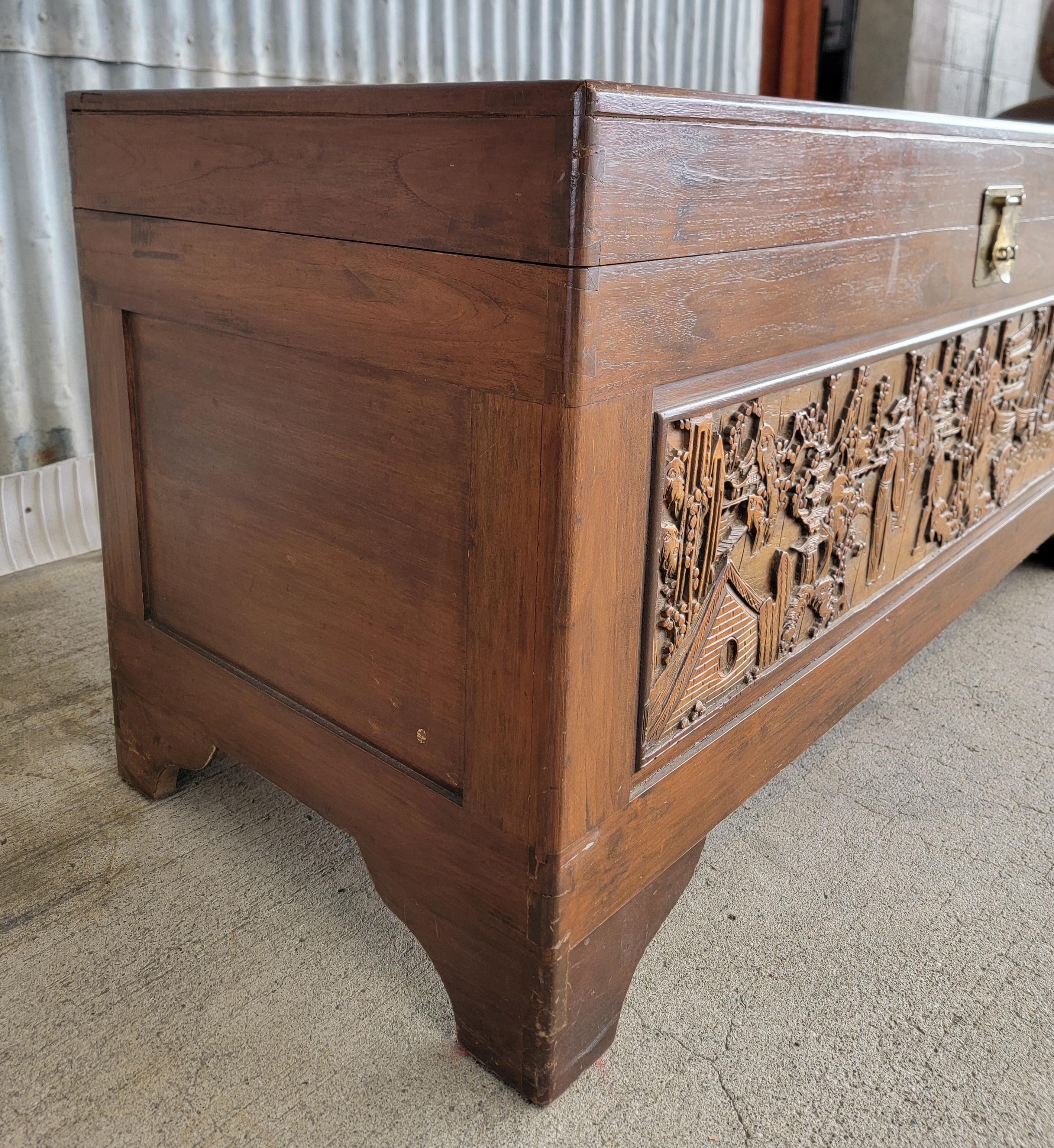 Hand-Carved High Relief Carved Camphor Wood Trunk  For Sale