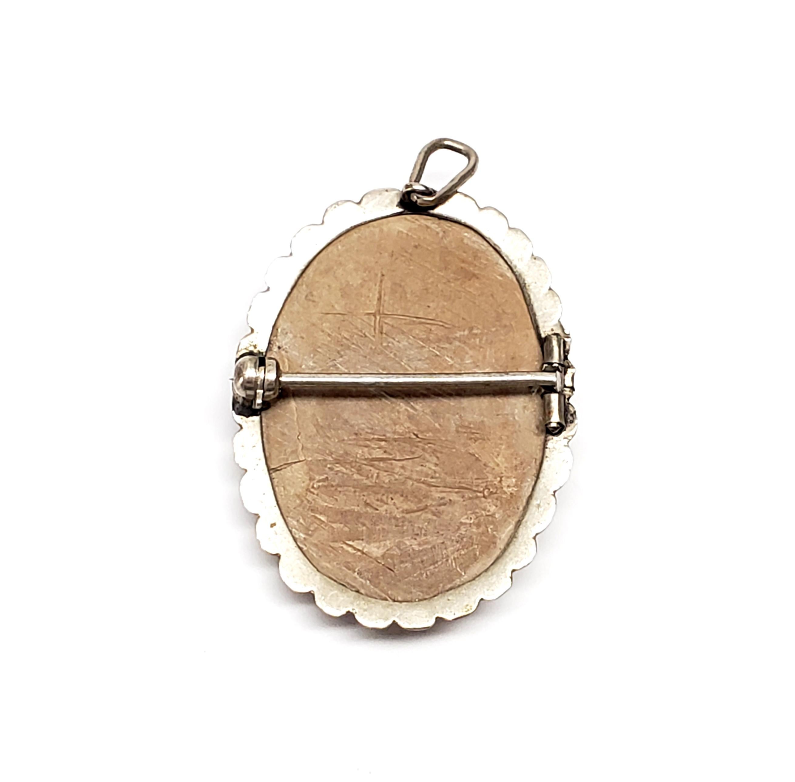 Antique silver carved lava cameo pin/pendant.

Carvers used lava excavated from Pompei and Herculaneum from Mt. Vesuvius in the early 19th century. This carved lava cameo features a highly detailed classic portrait of lady in profile, bezel set in a