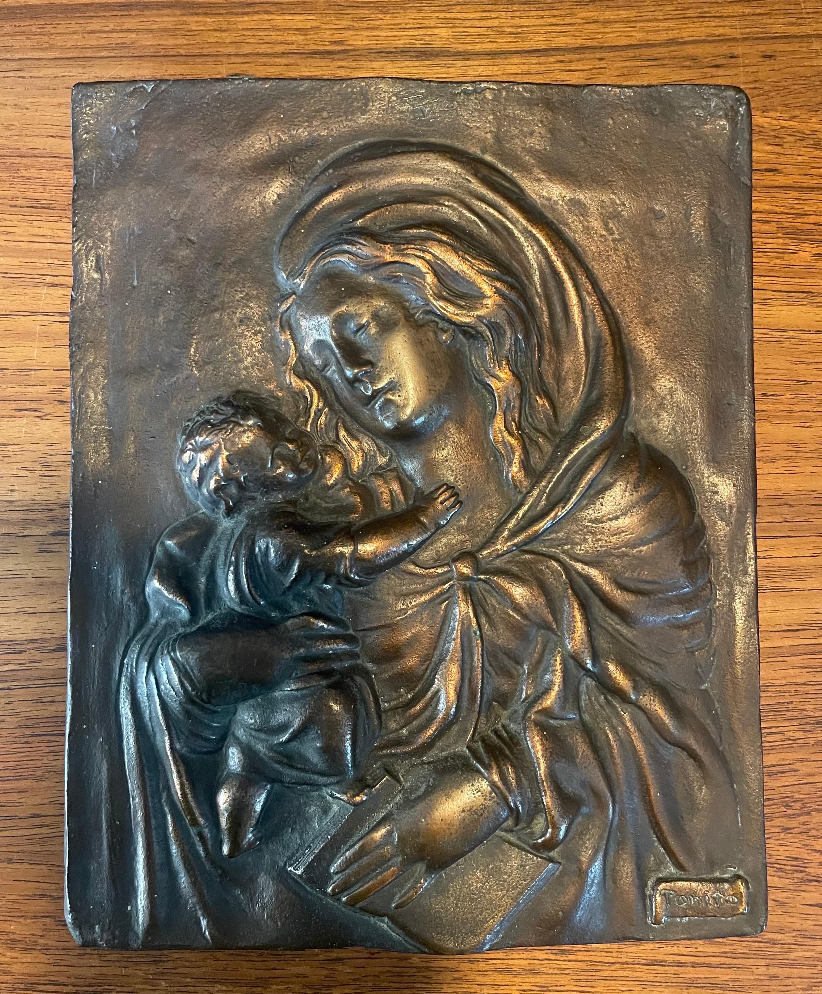 Rectangular high-relief copper Madonna & Child wall plaque, circa 1970s. The piece is made of cast copper and measures 8.5