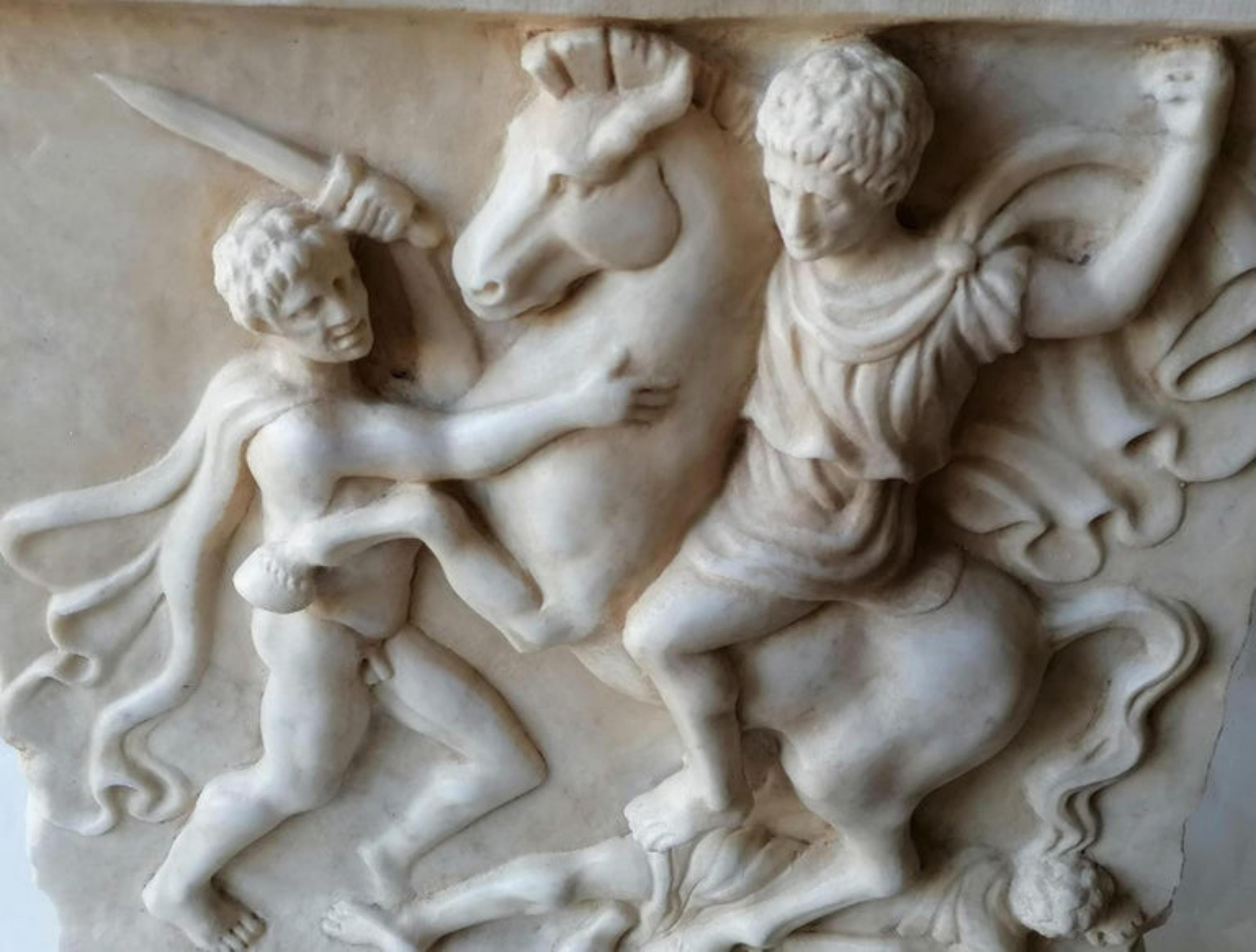 High relief representing battle in classical style. 
carved on white Carrara marble 
dimensions 46 h x 45 x 10 cm,
 weight 35.5 kg 
Skull -
