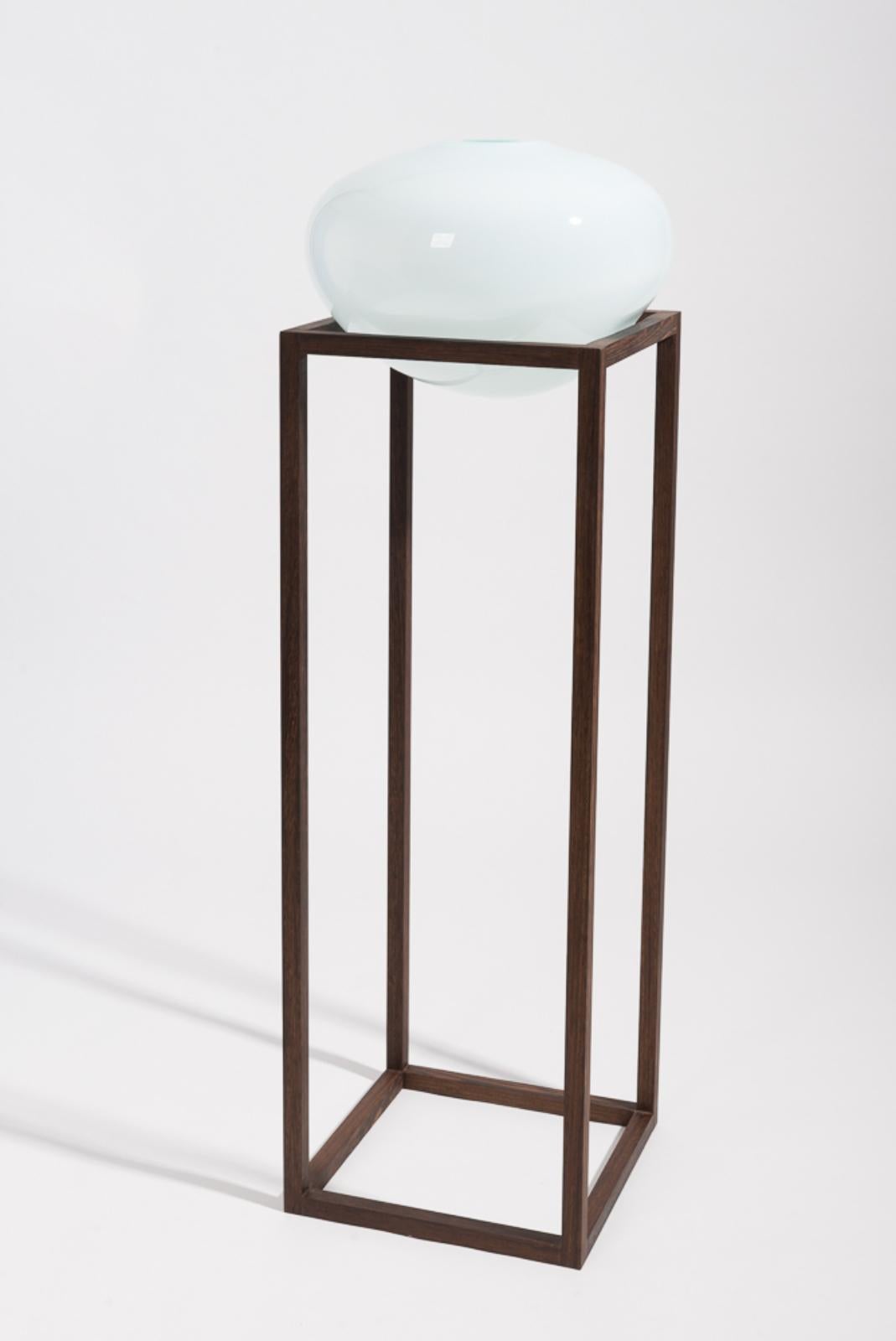 High round square green vase by Studio Thier & van Daalen
Dimensions: W 36 x D 36 x H 120 cm
Materials: Wood, Glass

When blowing soap bubbles in the air Iris & Ruben had the dream to capture these temporary beauties in a tendril frame. The