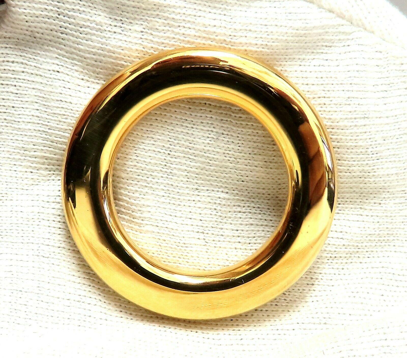 Circular Gold pin.

1.6 inch Diameter

1.04 inch inner opening

.32 inch frame

14kt. yellow gold 

8.9 grams