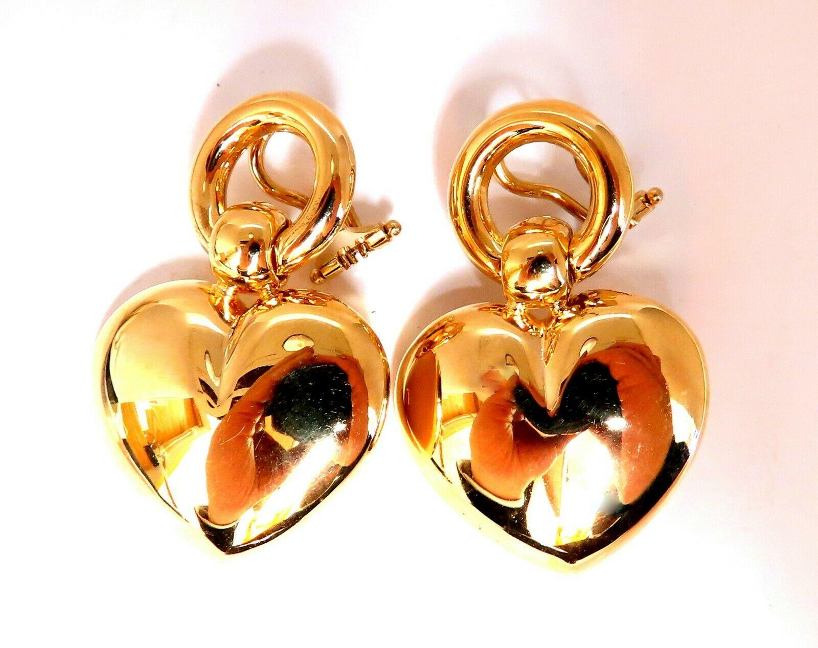 High shine Heart Dangle earrings

Measurements of Earrings:

1 inch wide 

1 5/8 inch long

14 grams / 14kt. yellow gold

Omega Clip Comfort

Earrings are gorgeous made